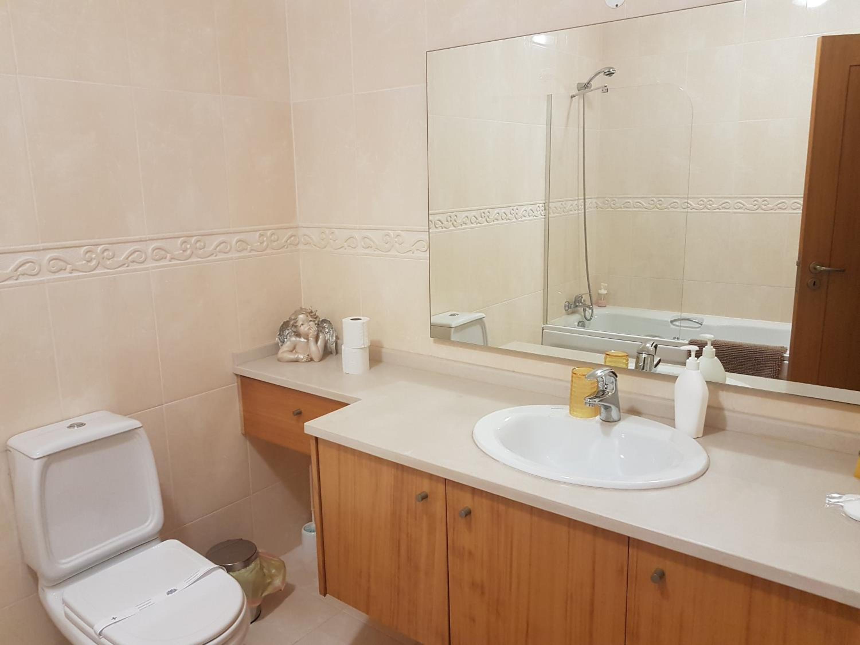 Three-Bedroom House - Photo 19