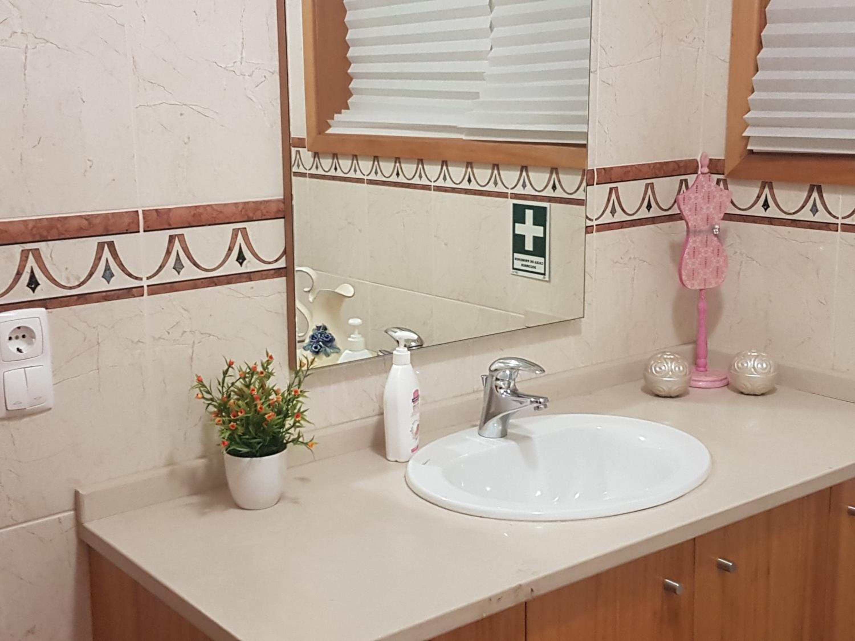 Three-Bedroom House - Photo 17