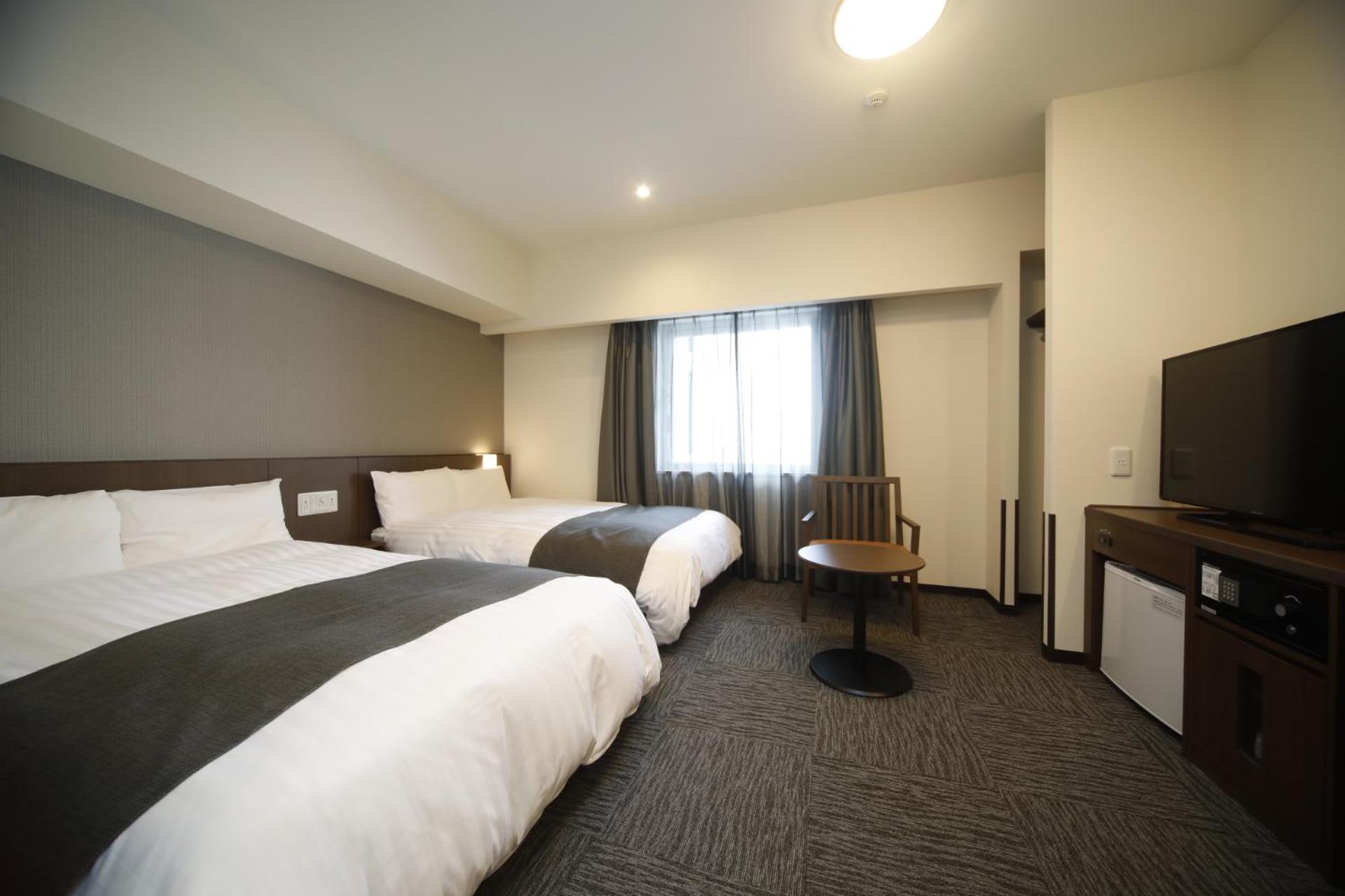 Twin Room - Non-Smoking - Photo 1