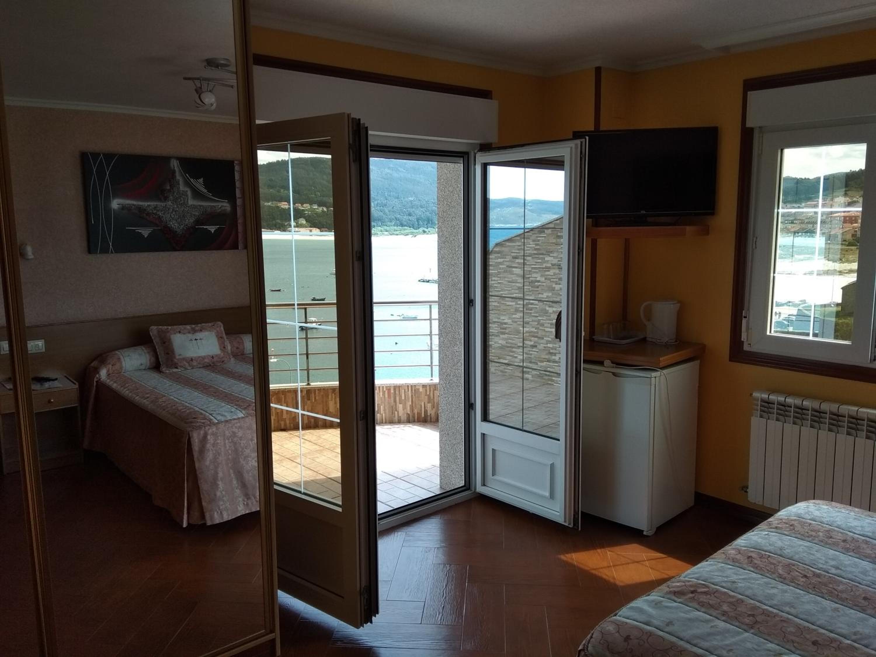 Habitación Doble Deluxe con Balcón y Vista al Mar