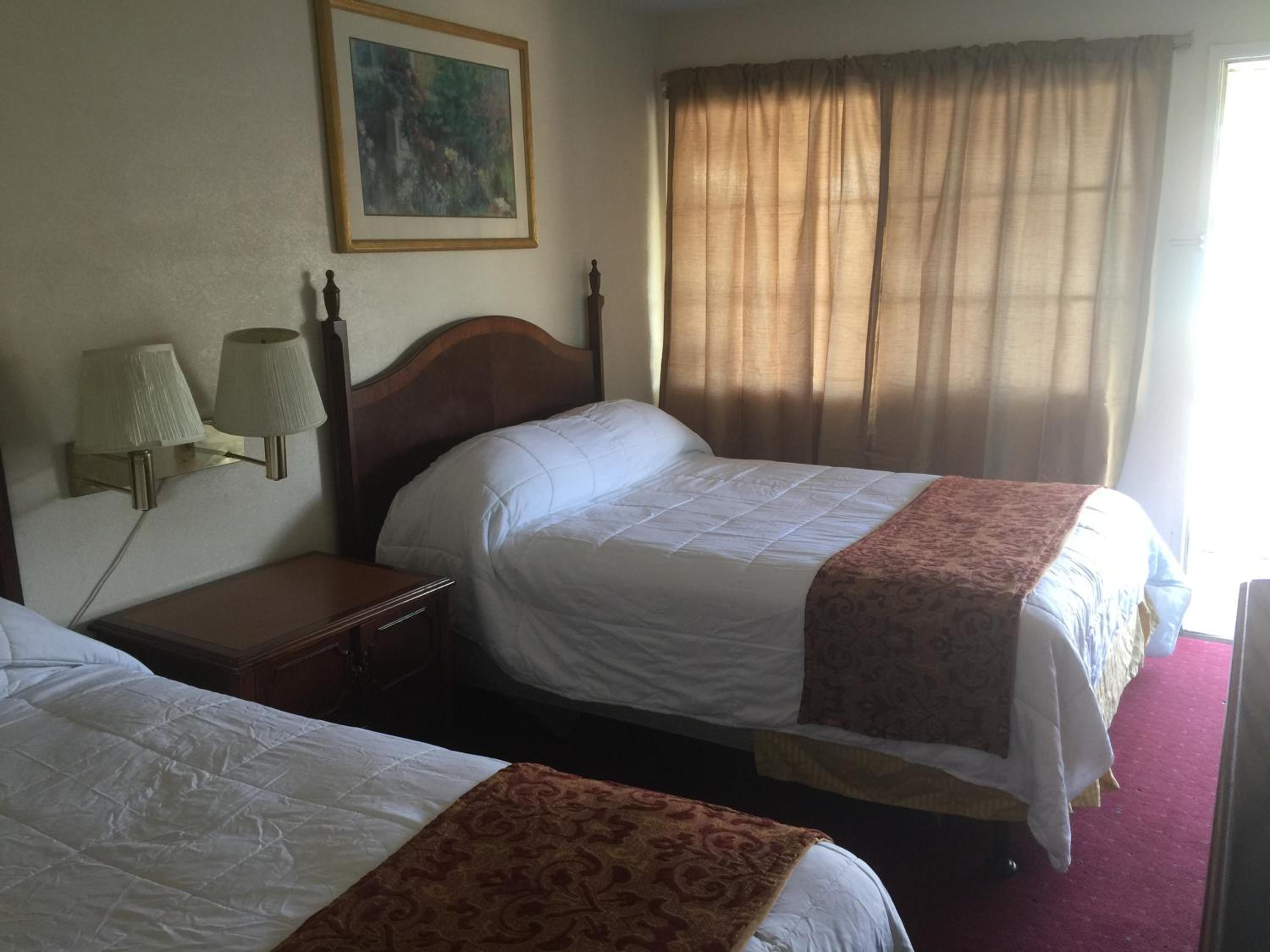 Standard Queen Room with Two Queen Beds - Photo 1