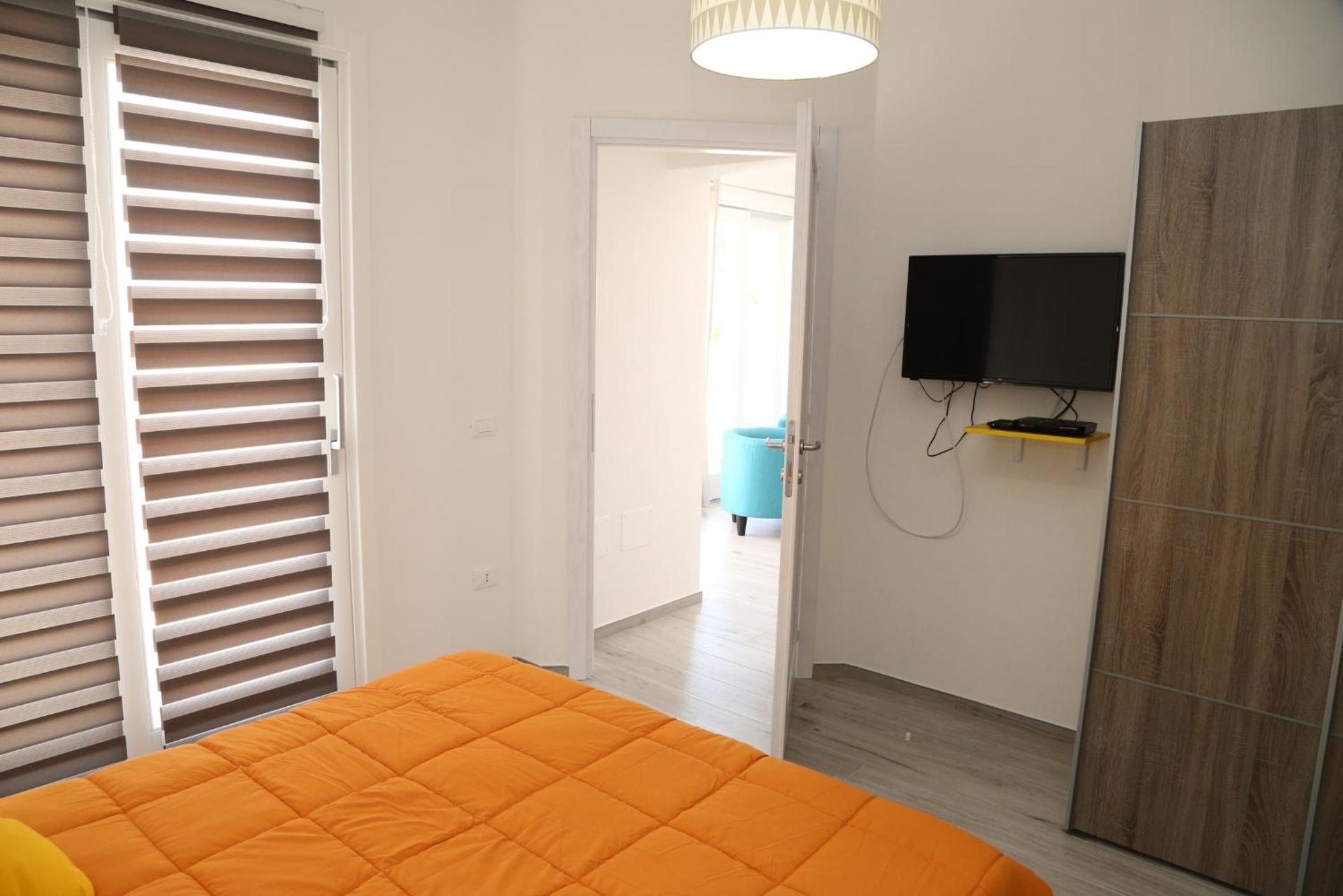 Deluxe Double Room (2 Adults + 1 Child) - Photo 13