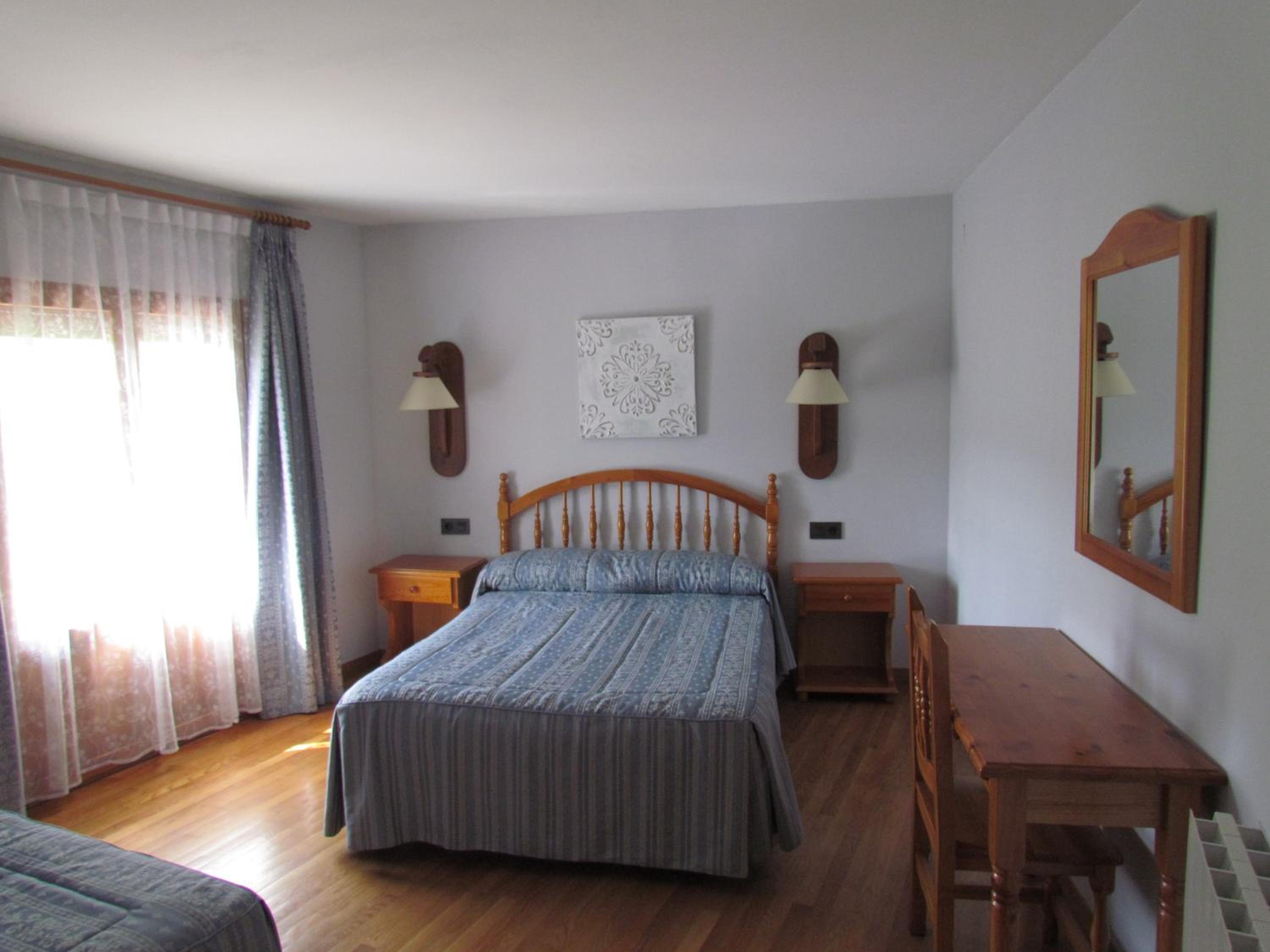 Habitación Triple con Balcón