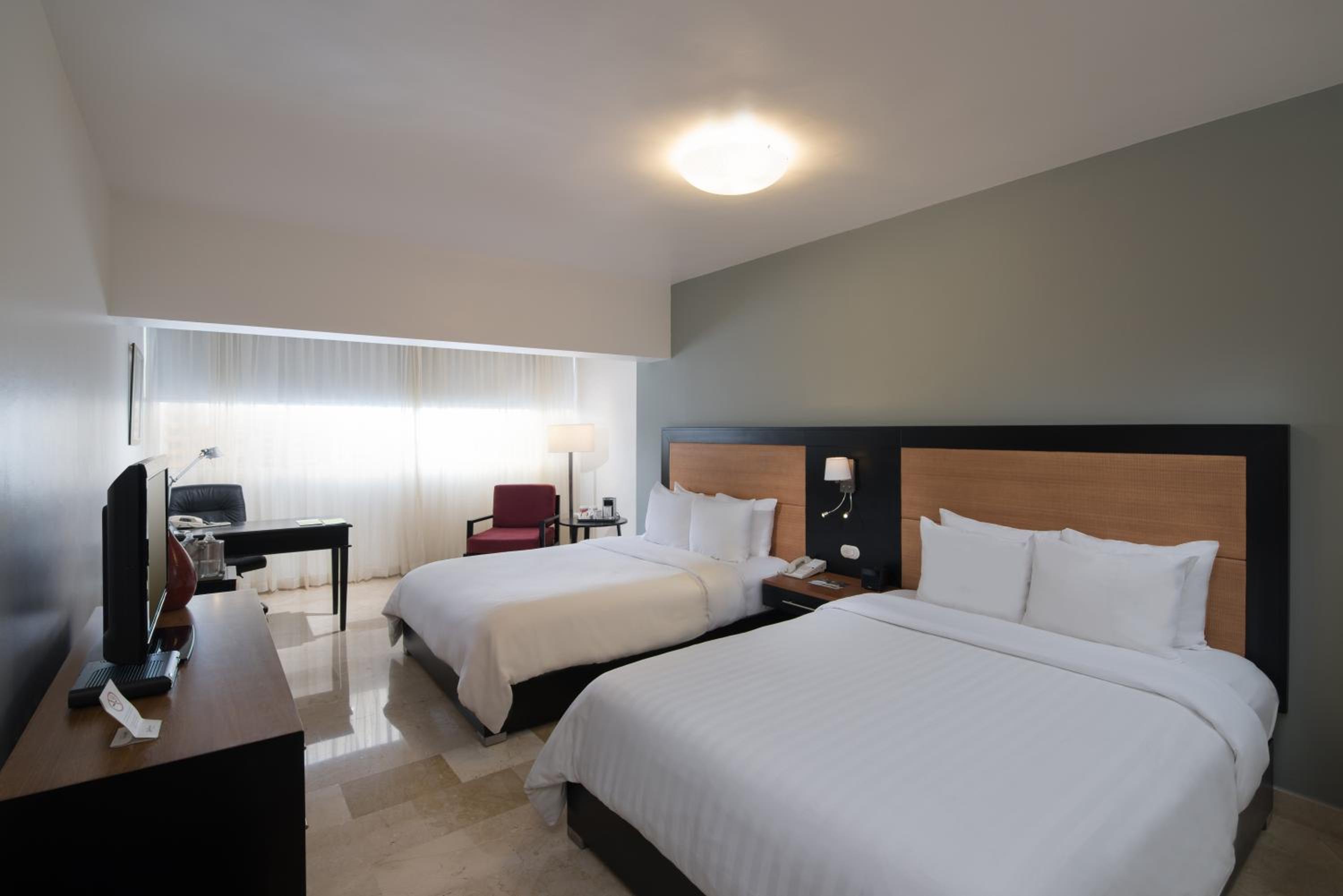 Premium Two Queen Beds - Non-Smoking - Photo 1