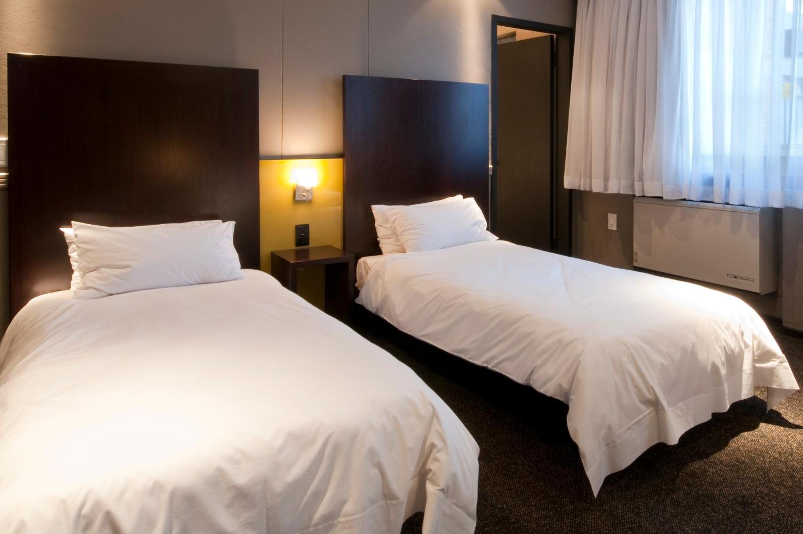 Twin Room - Photo 1