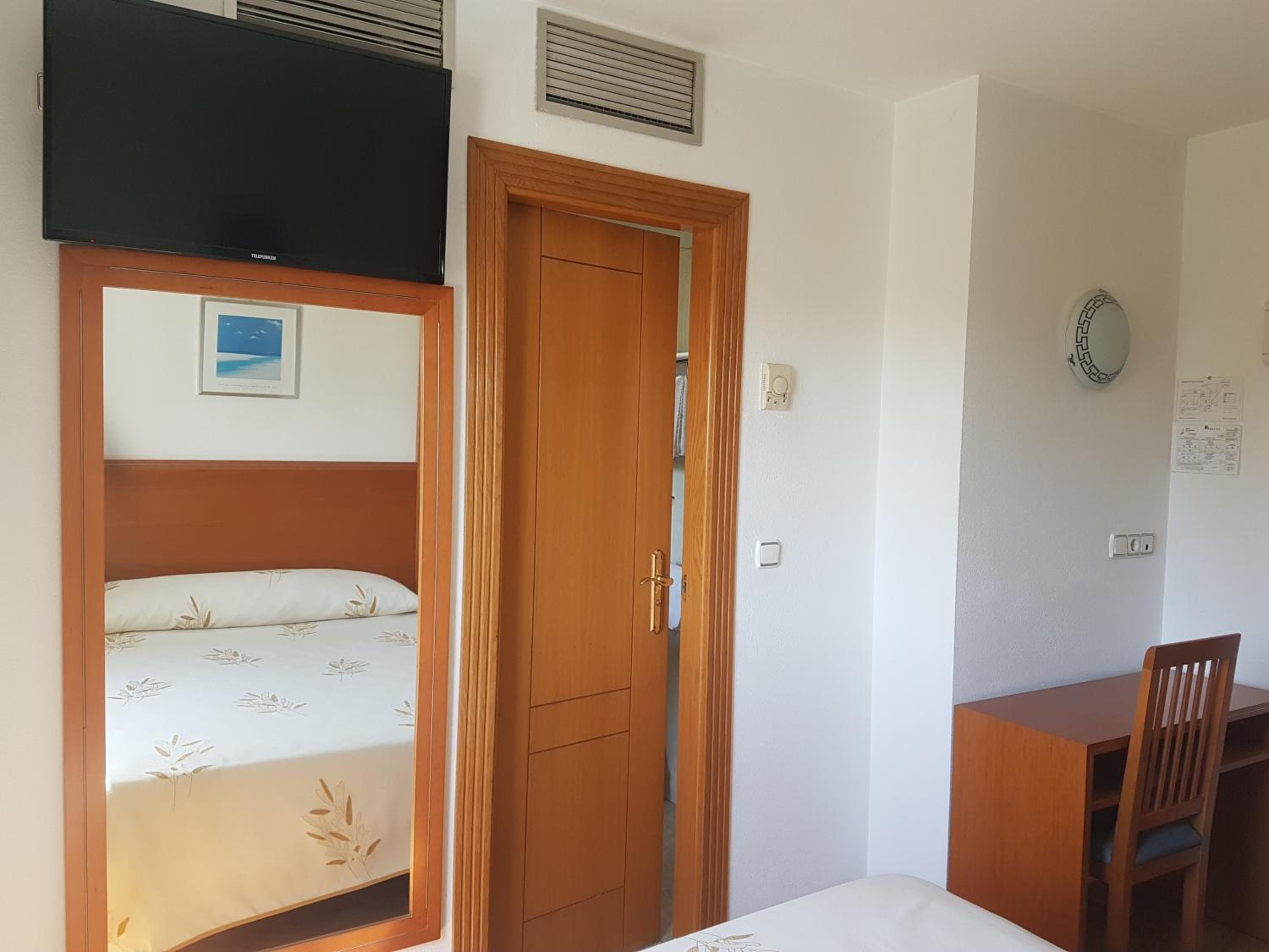 Habitación Estándar con Cama Queen