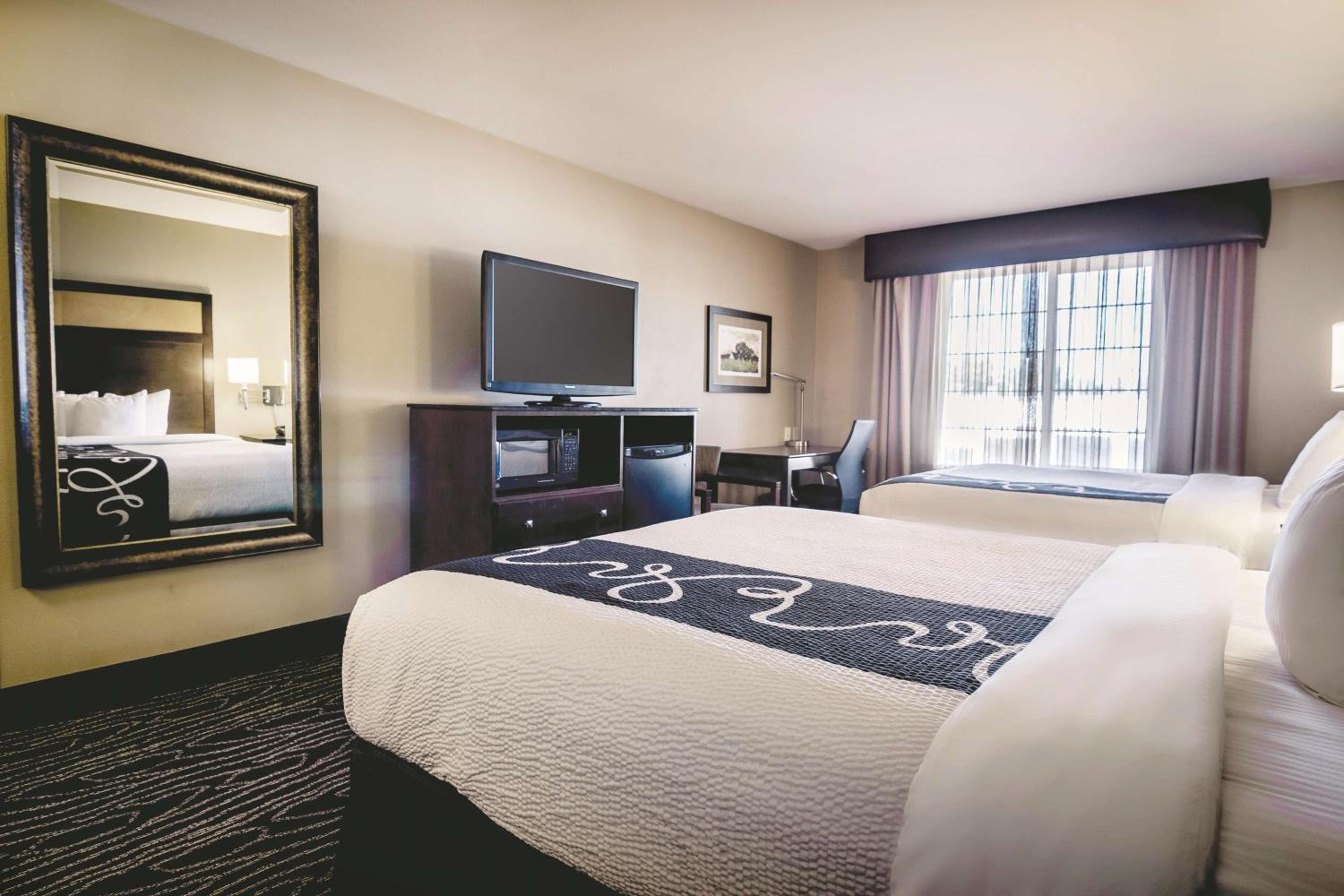 Deluxe Queen Room with Two Queen Beds - Photo 1