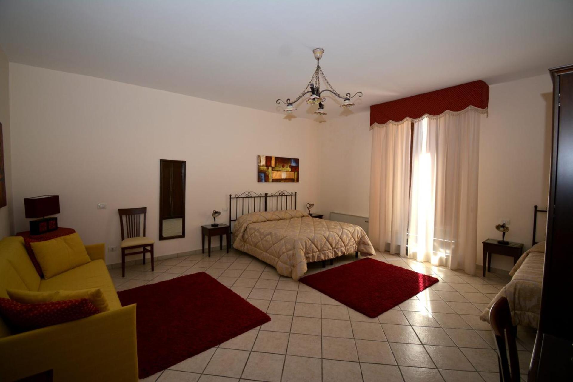 Quadruple Room - Photo 1