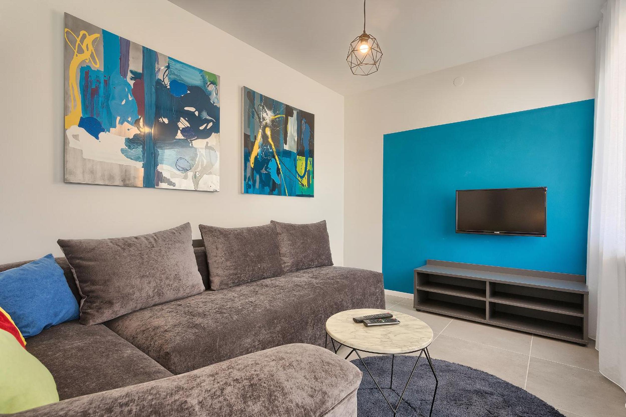 One-Bedroom Apartment with Balcony and Garden View