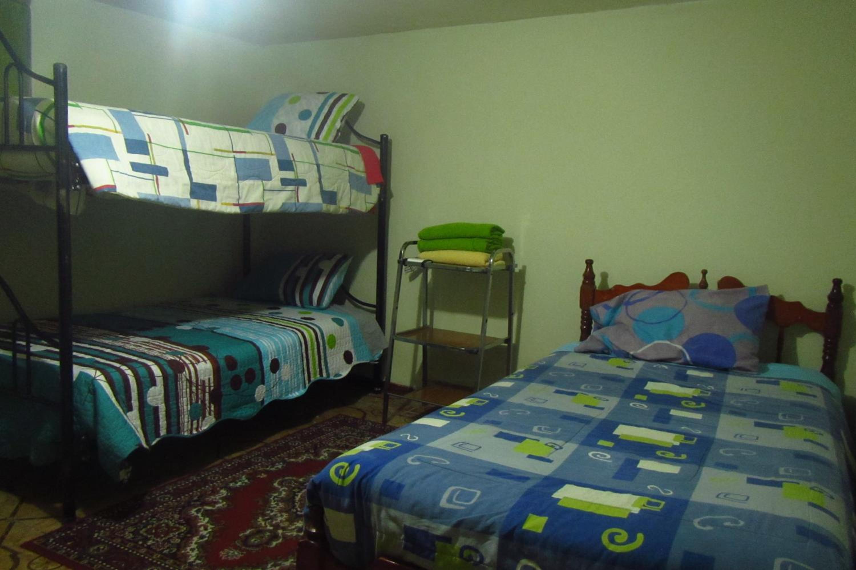 Basic Triple Room with Shared Bathroom photo 1