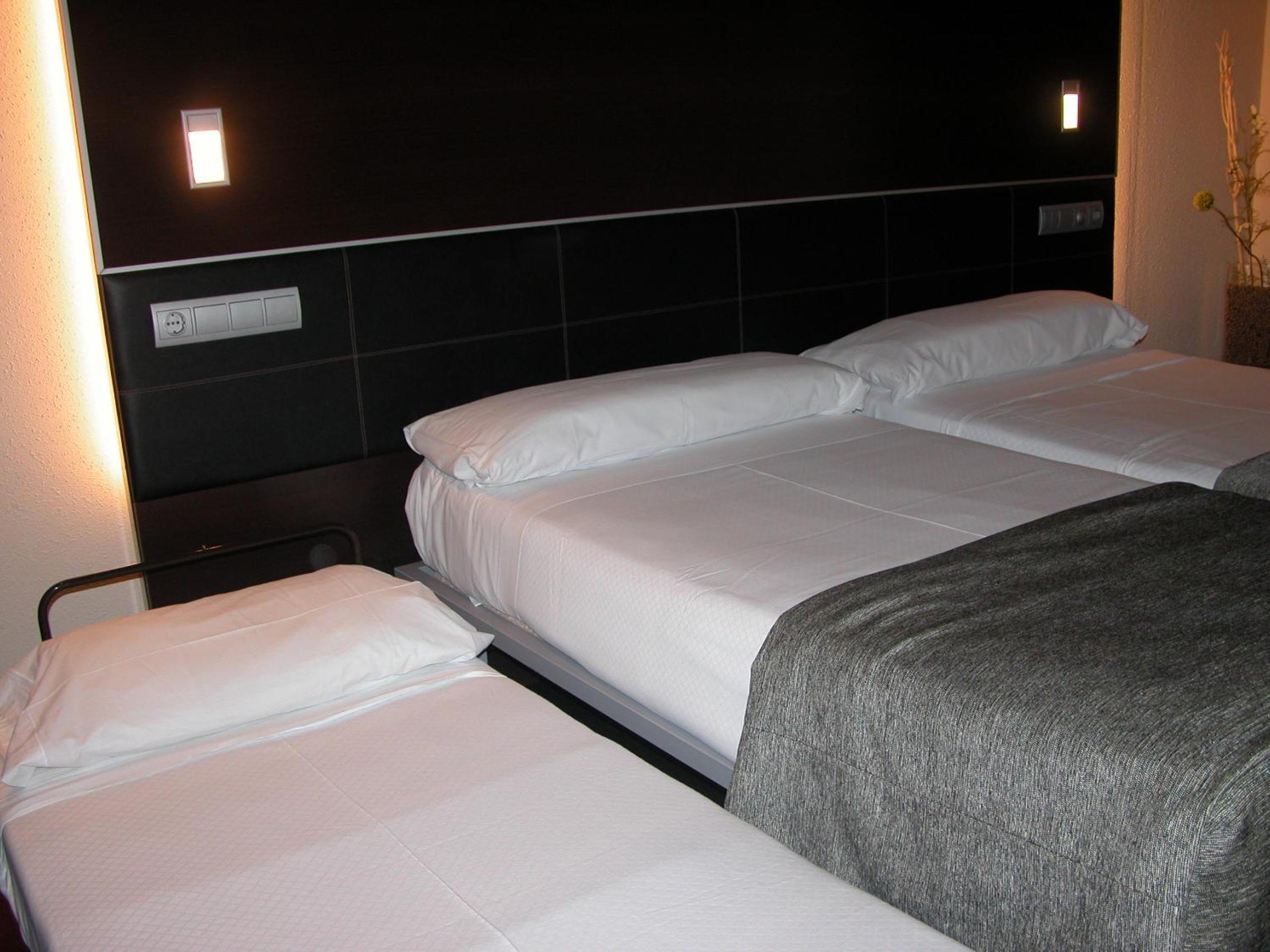 Habitación Doble o con Dos Camas con Cama Extra (2 Adultos + 1 Niño)