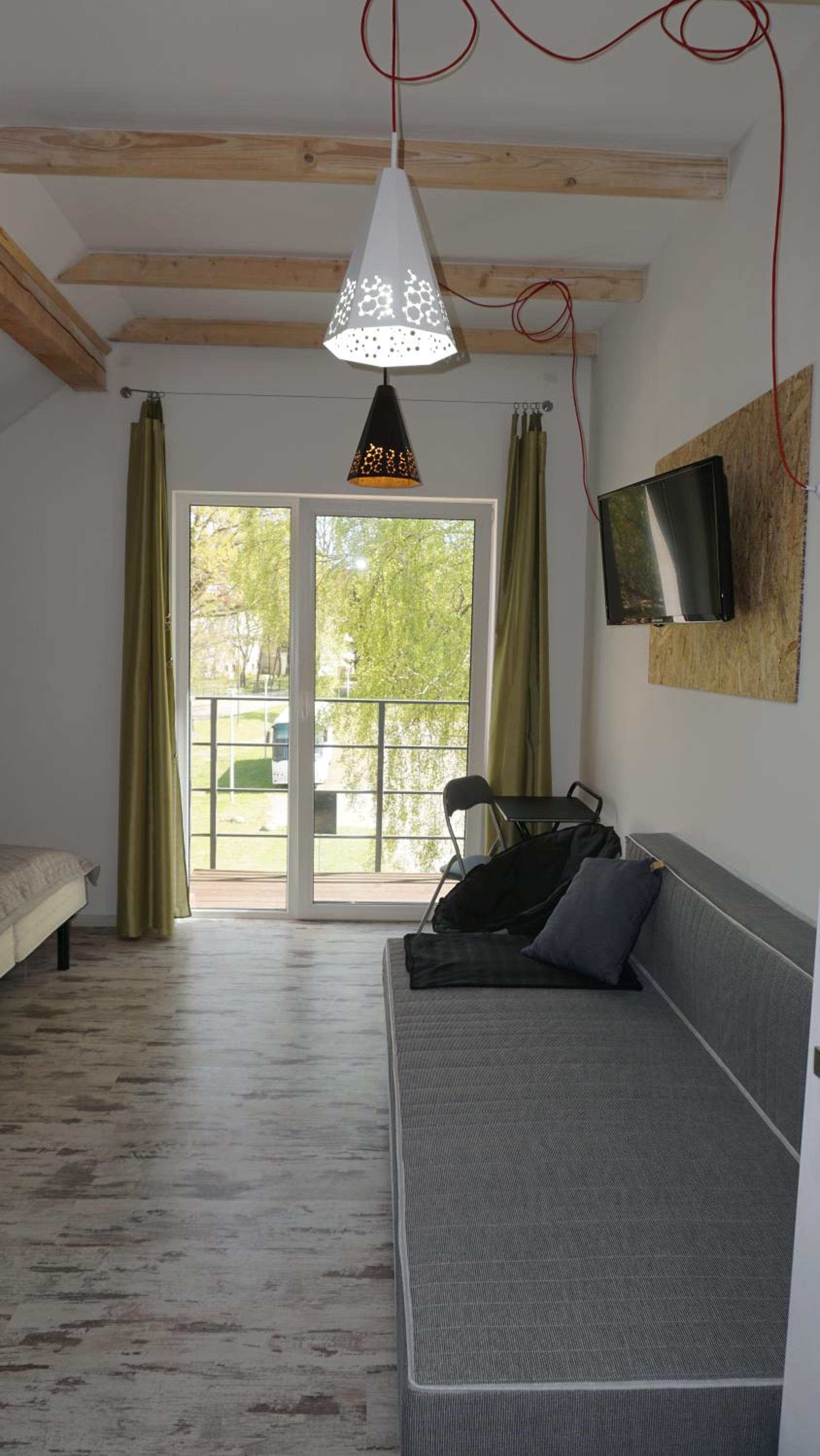 Three-Bedroom Apartment - Photo 26