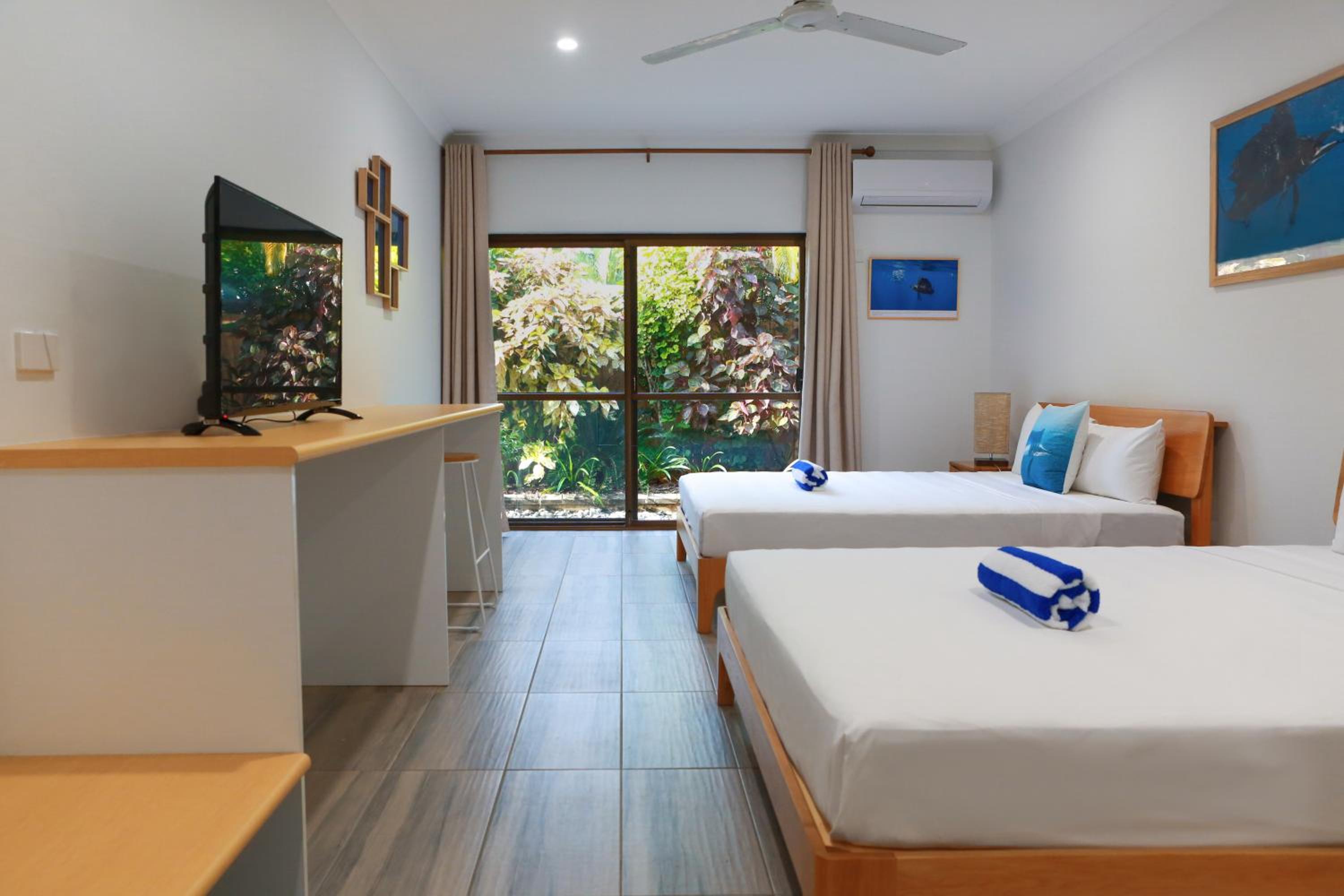 Queen Room with Two Queen Beds - Photo 1