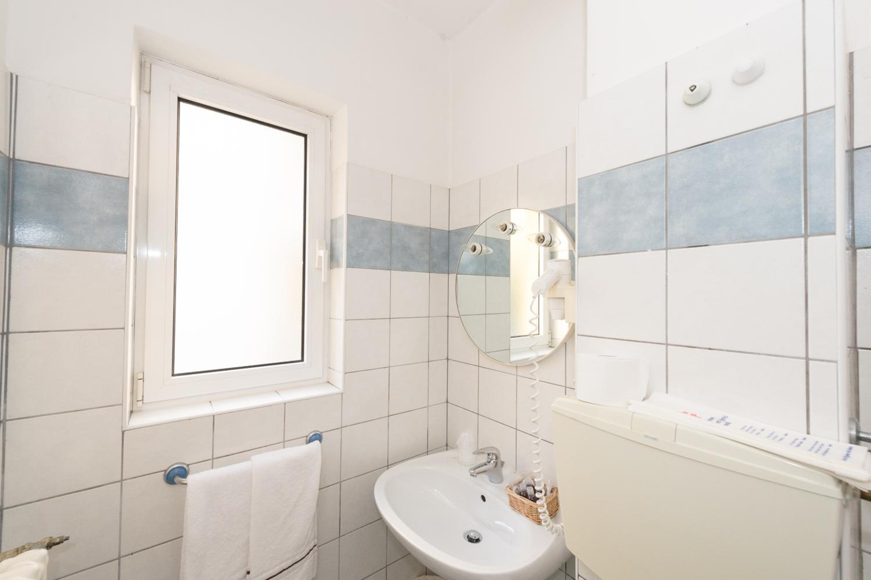 Quadruple Room with Balcony photo 2