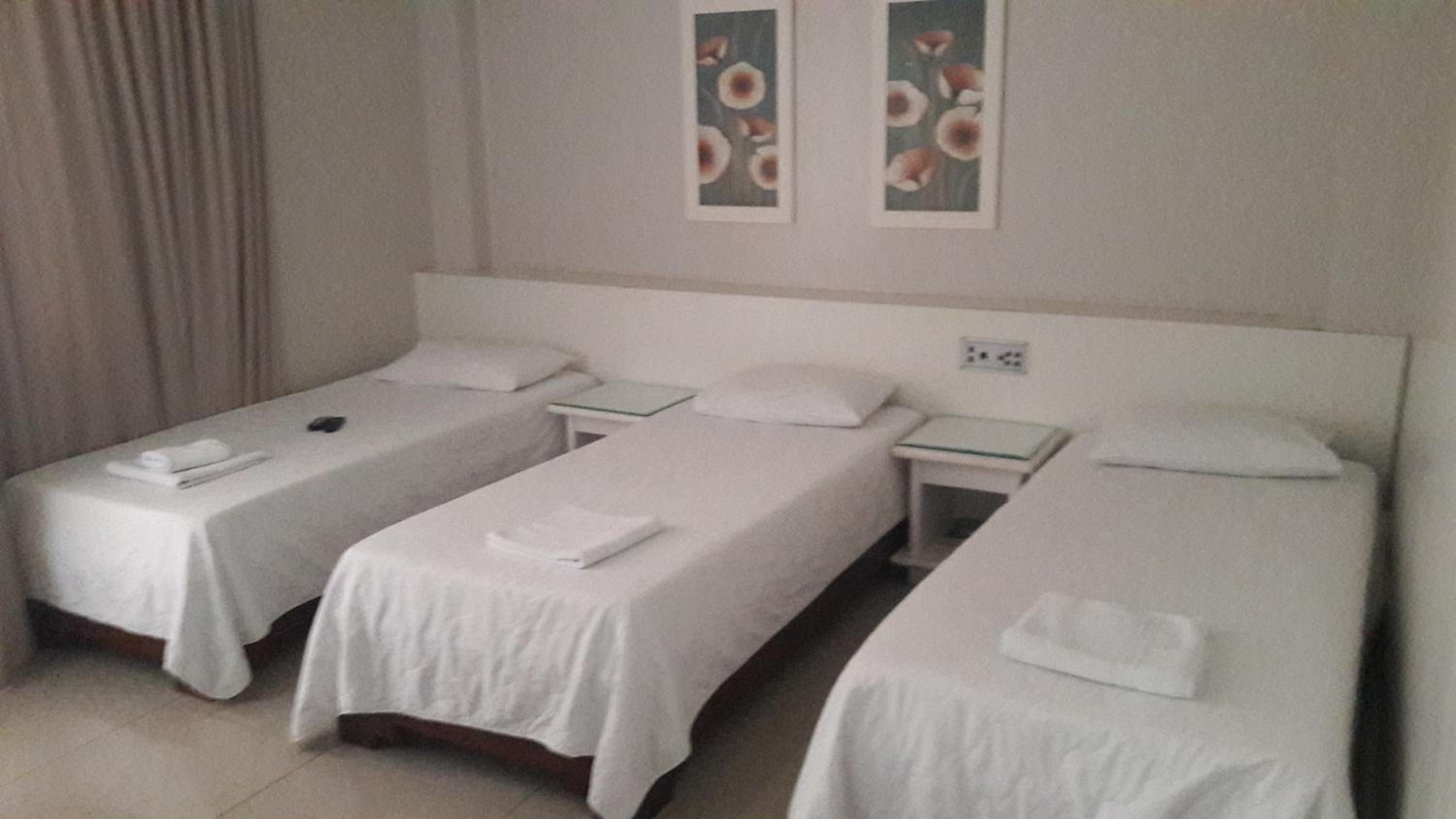 Basic Triple Room with Shared Bathroom photo 1