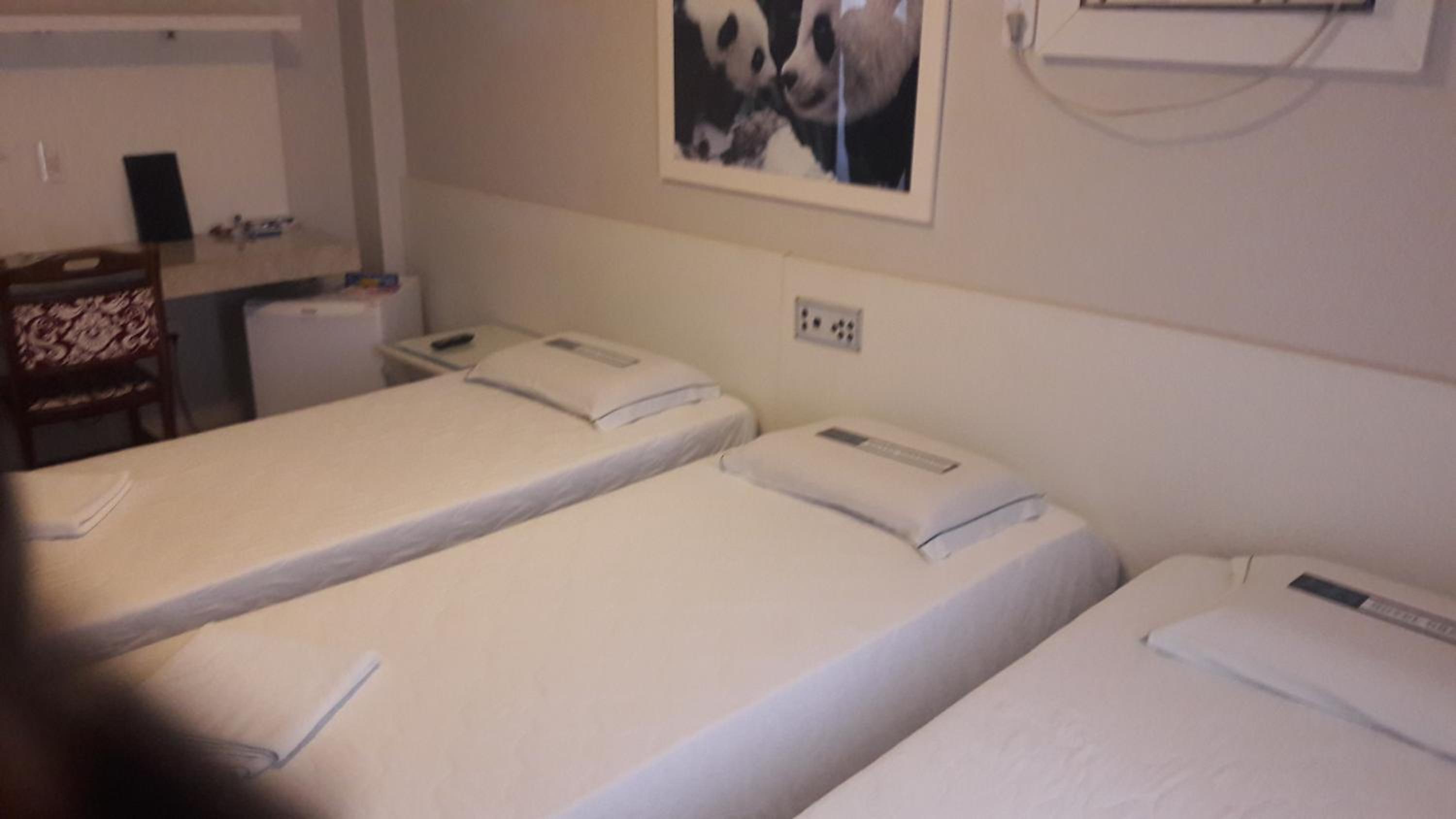 Basic Triple Room with Shared Bathroom photo 2