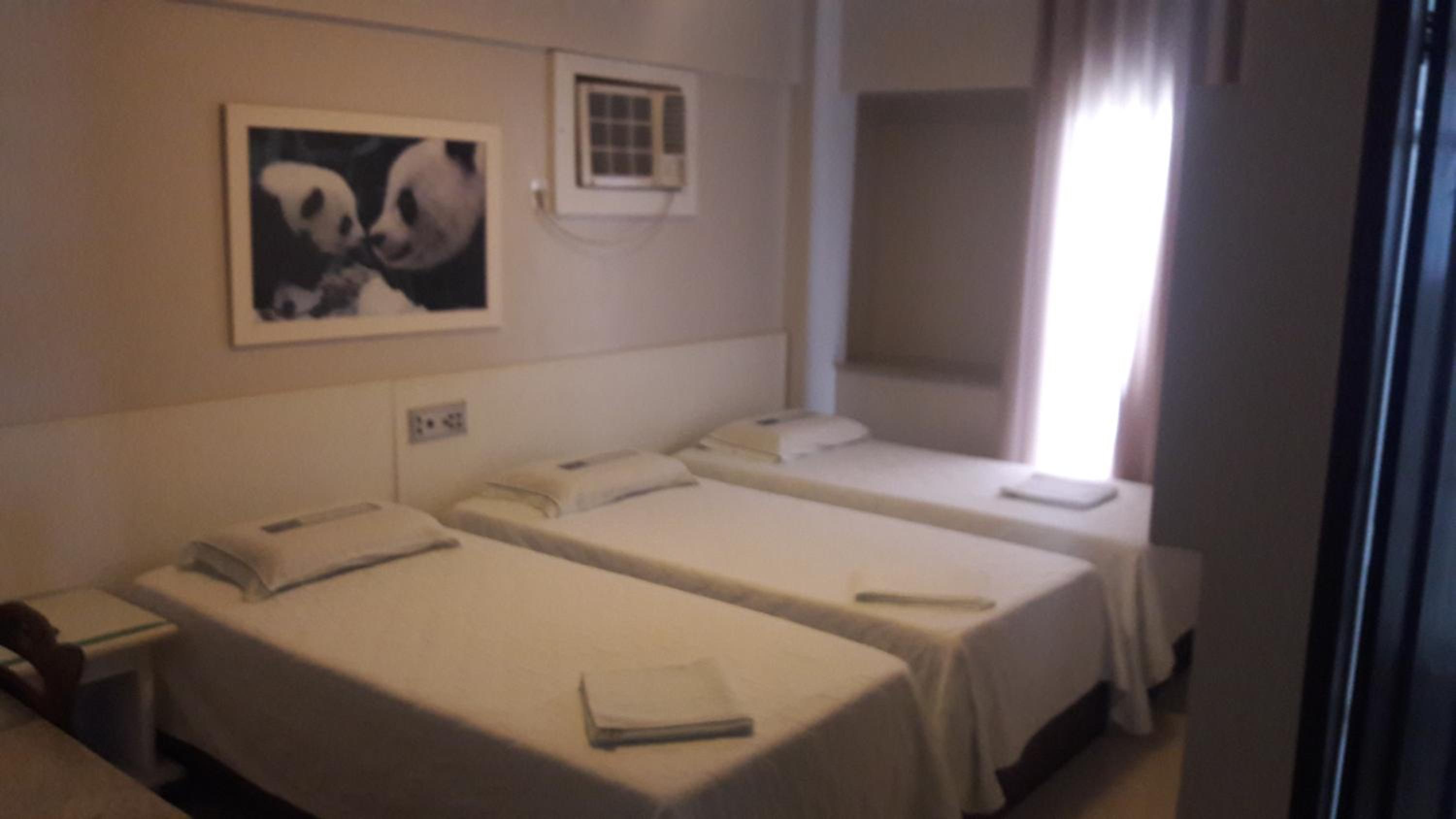Basic Triple Room with Shared Bathroom photo 3