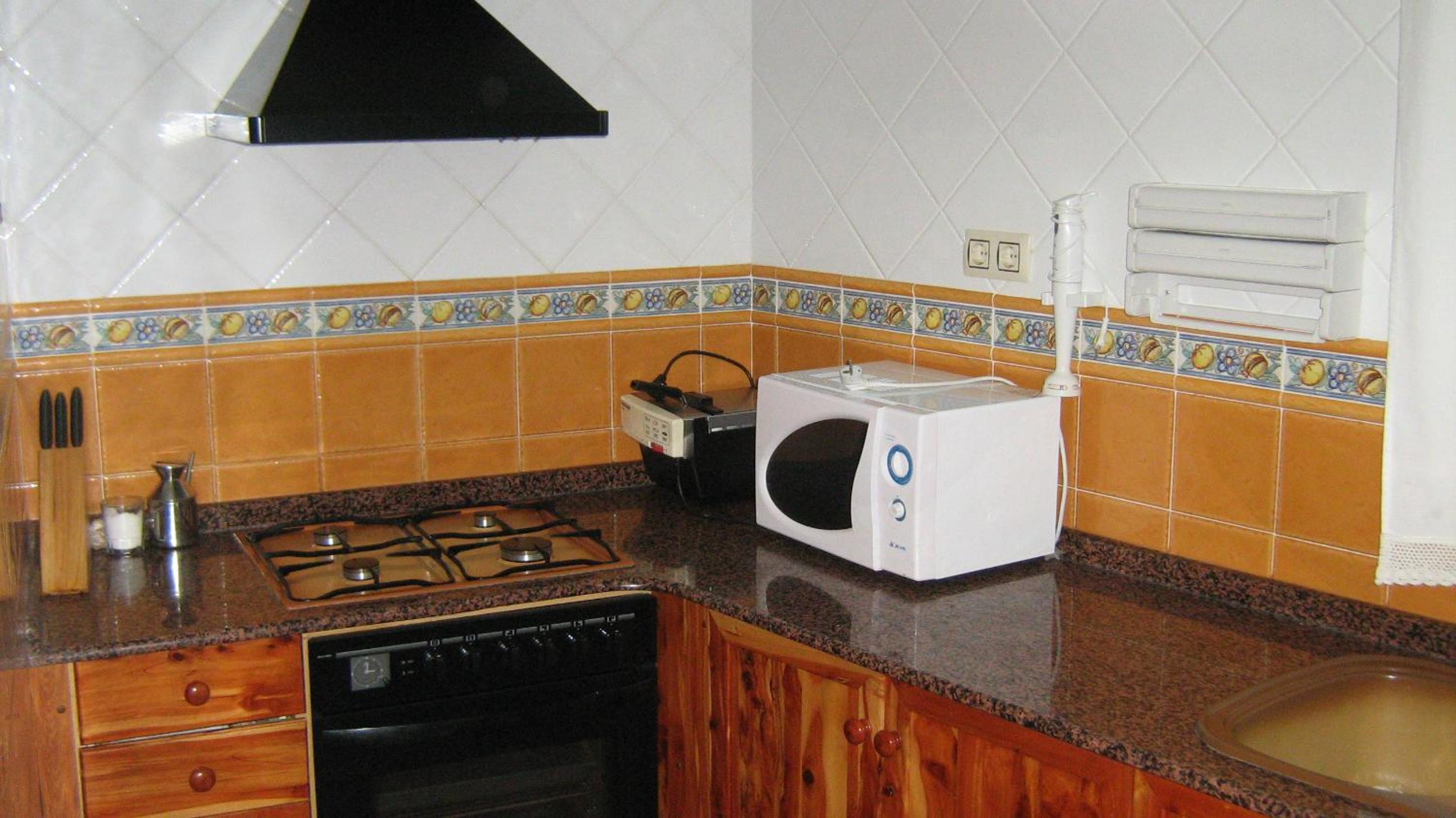 Four-Bedroom House - Photo 18