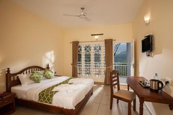 Deluxe Room - Photo 2
