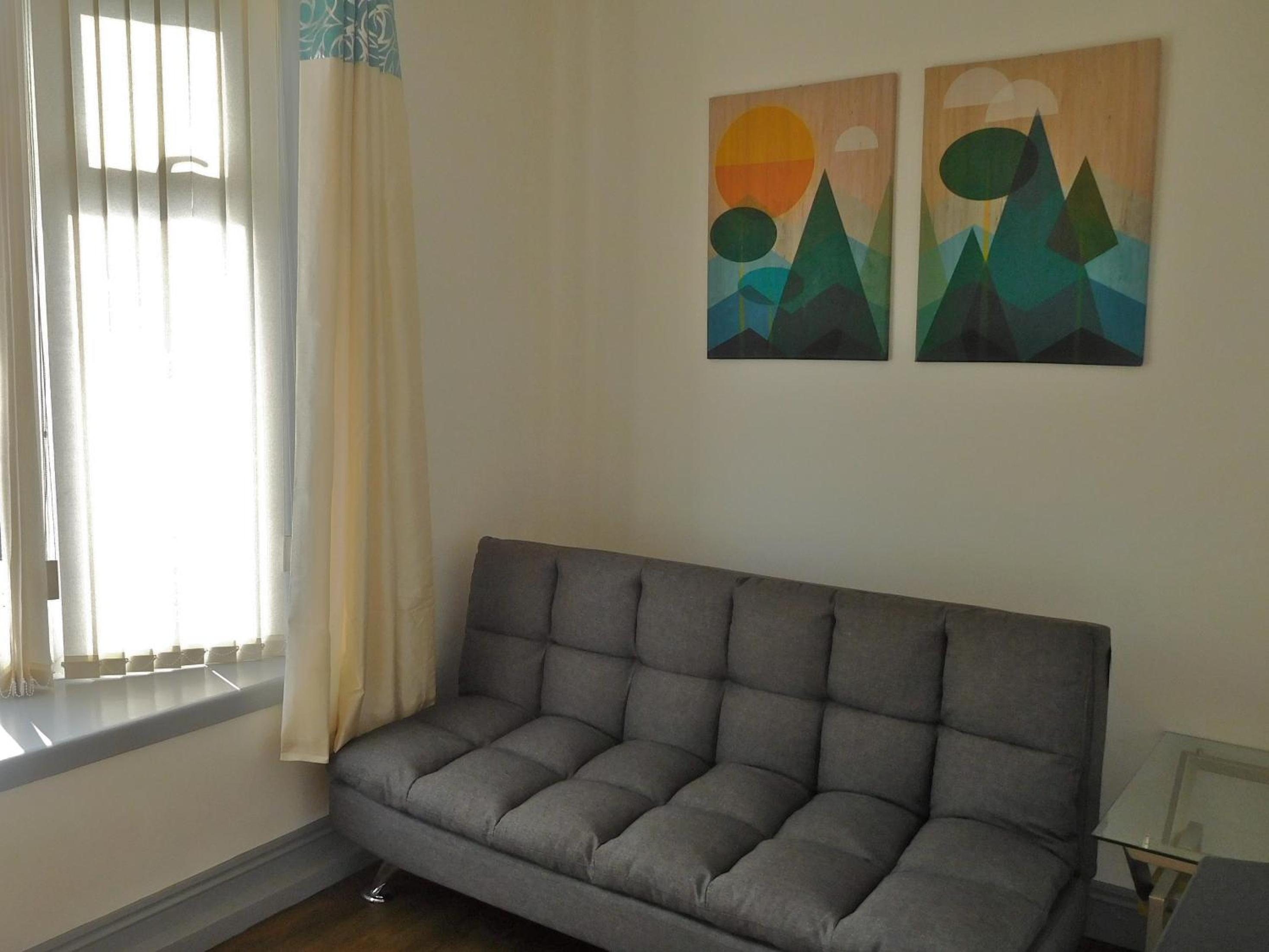 Three-Bedroom Apartment - Photo 1