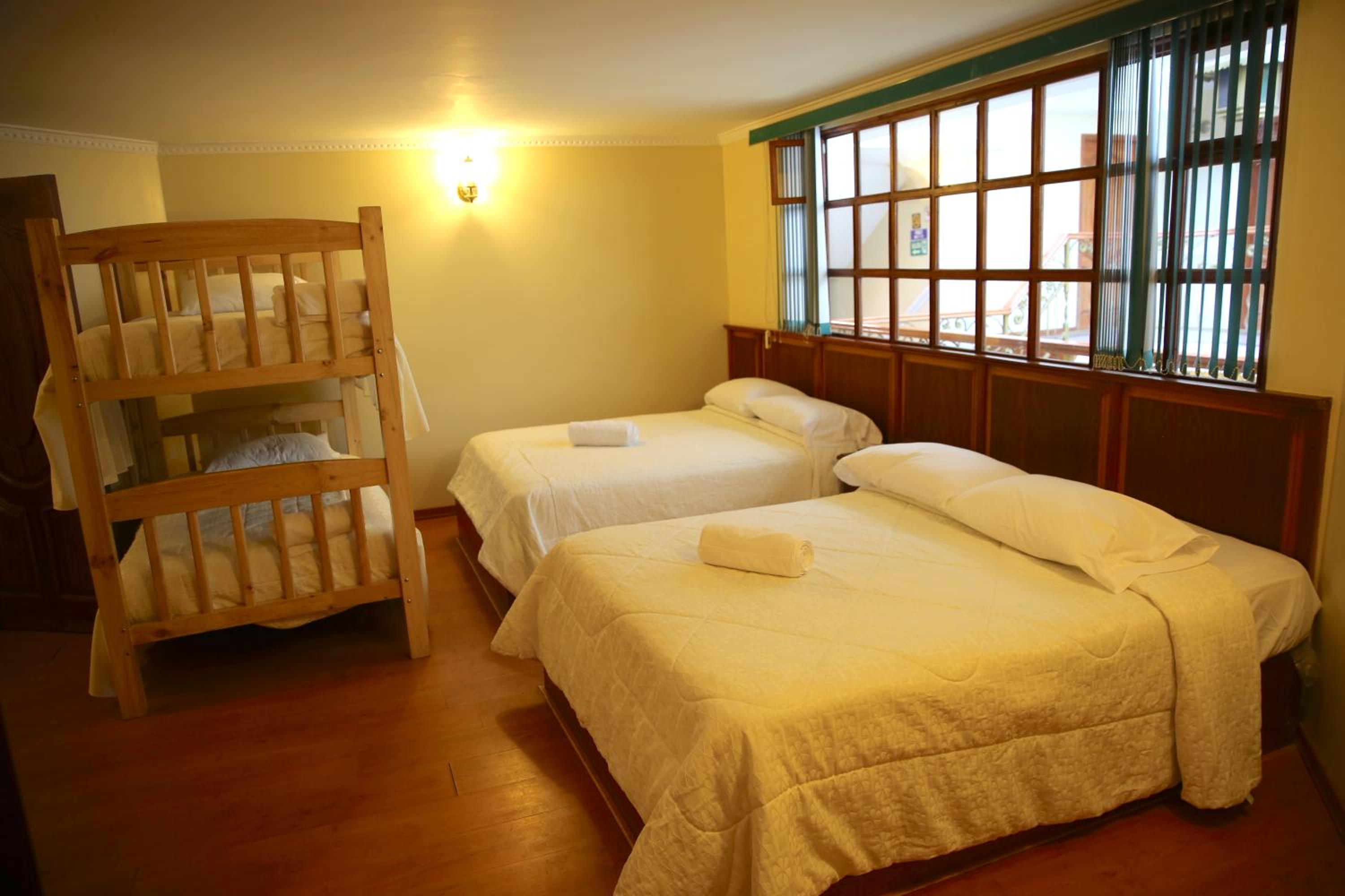 Quadruple Room with Private Bathroom