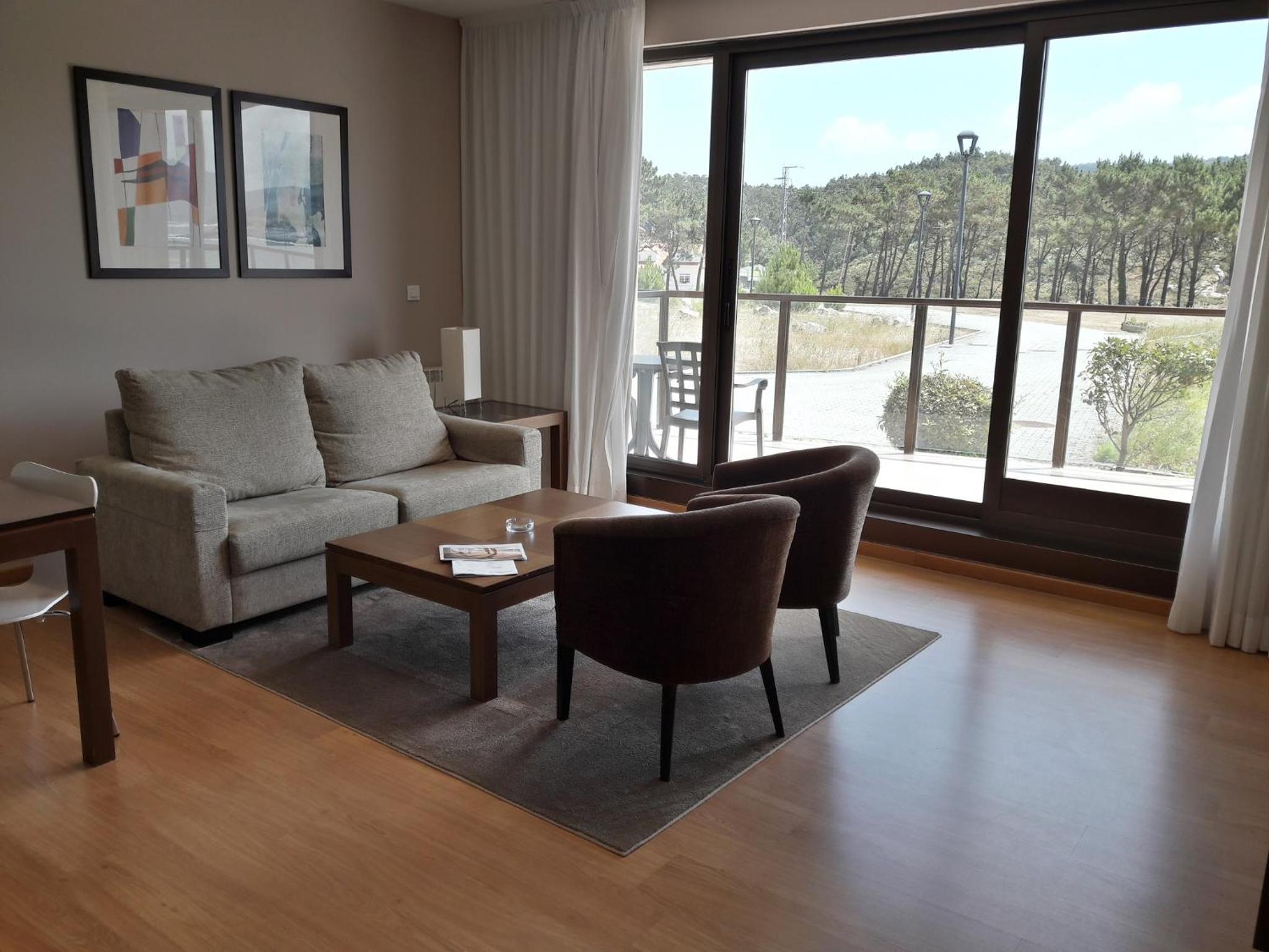 Apartamento con vista lateral al mar - Planta baja