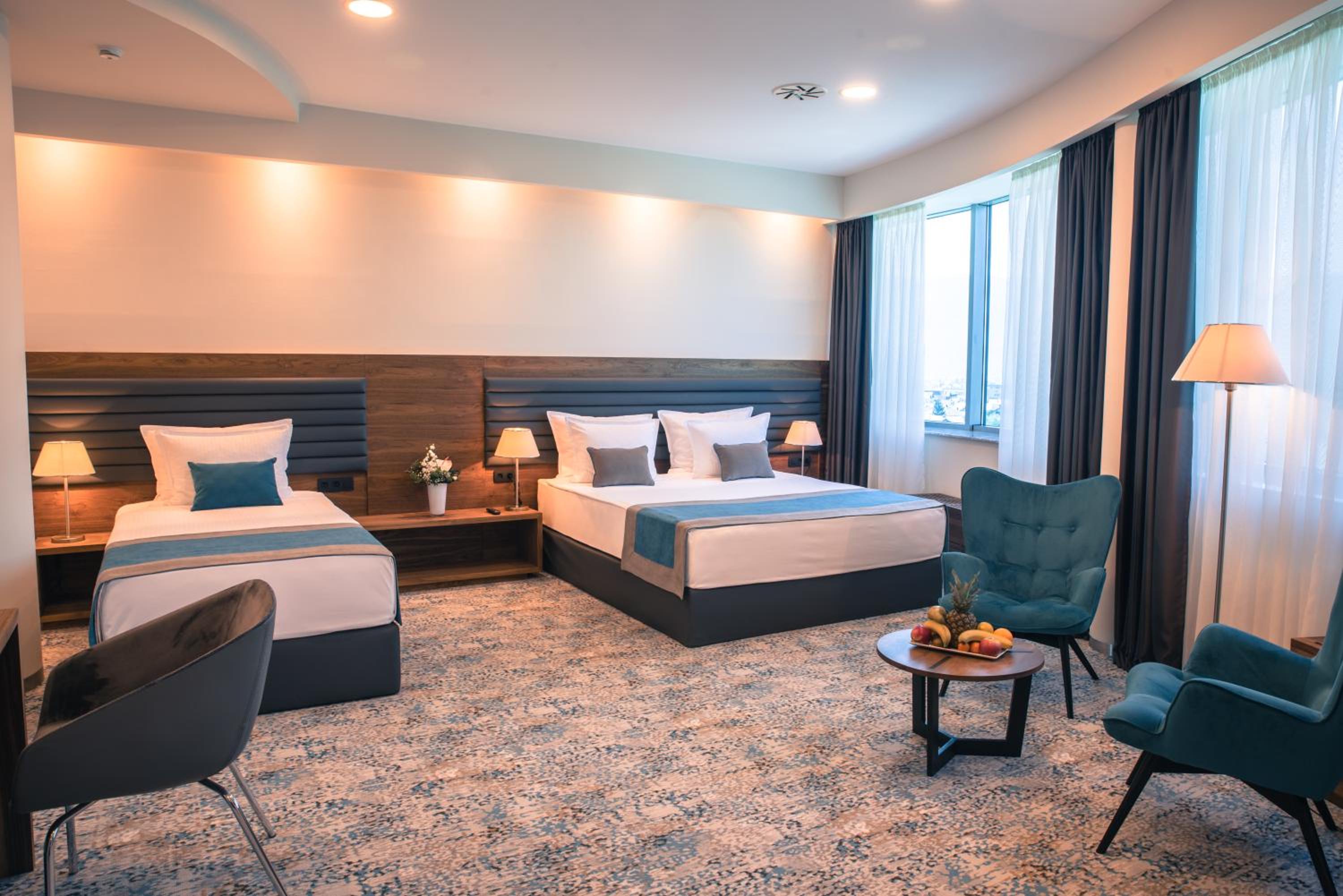 Premium Triple Room - Photo 1
