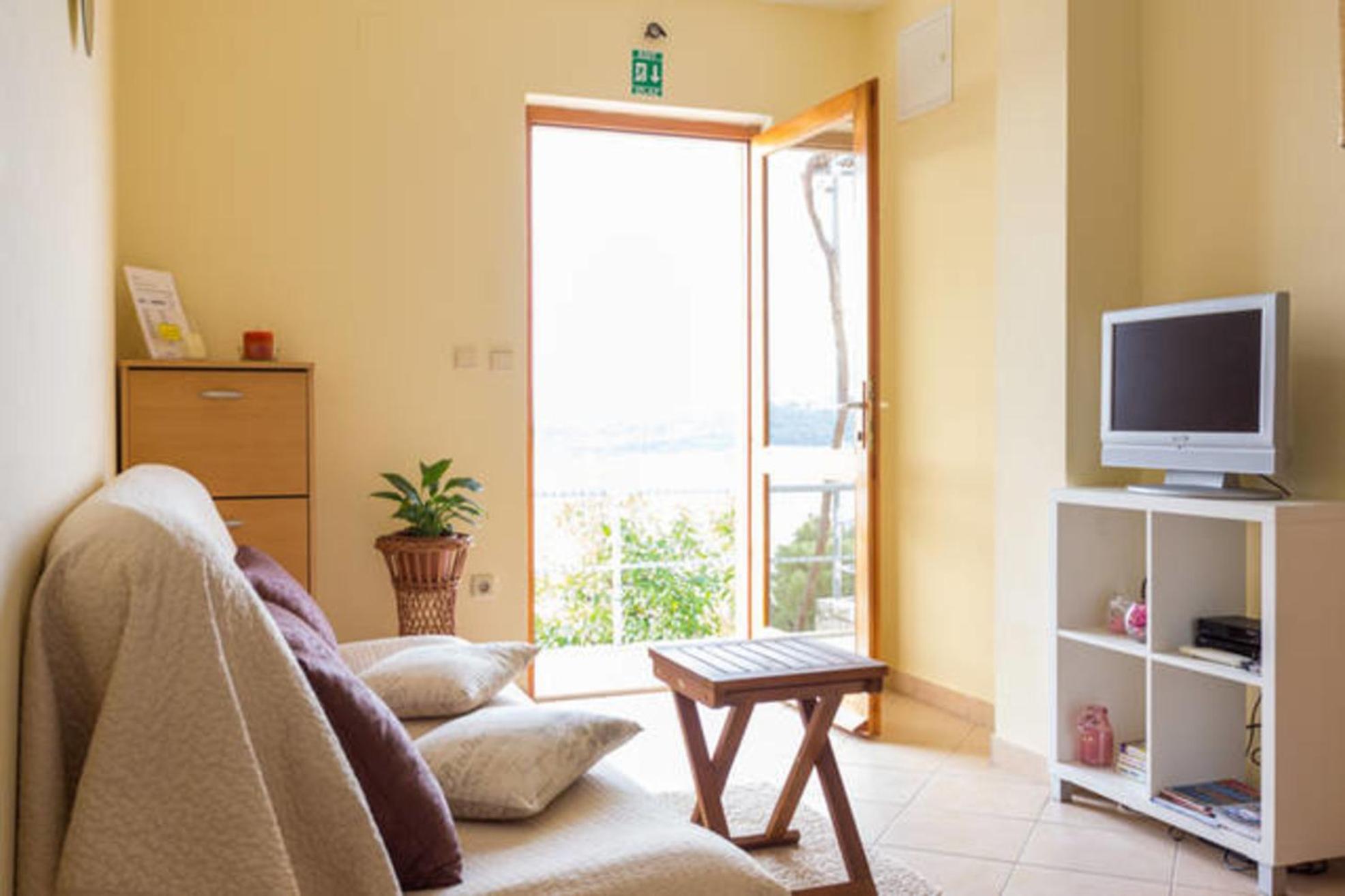 One-Bedroom Apartment with Balcony and Sea View