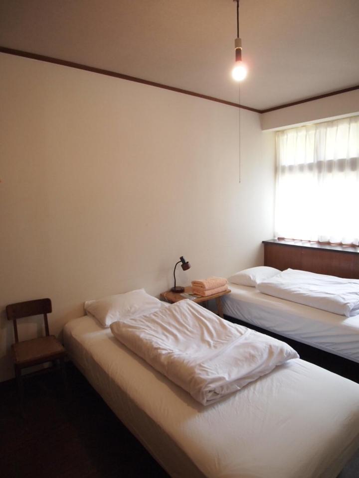 Twin Room with Shared Bathroom photo 2
