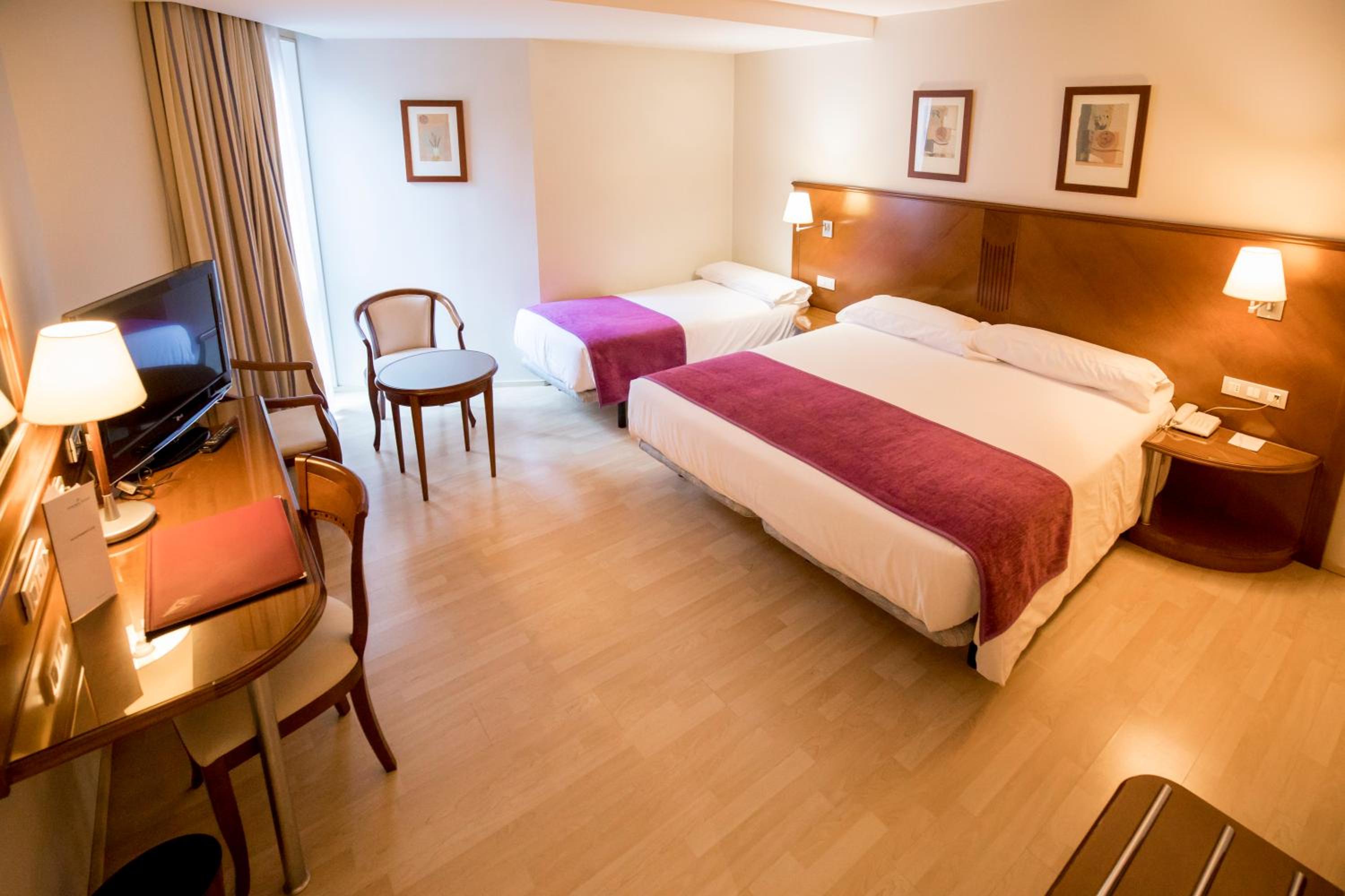 Triple Room (2 Adults + 1 Child) photo 2