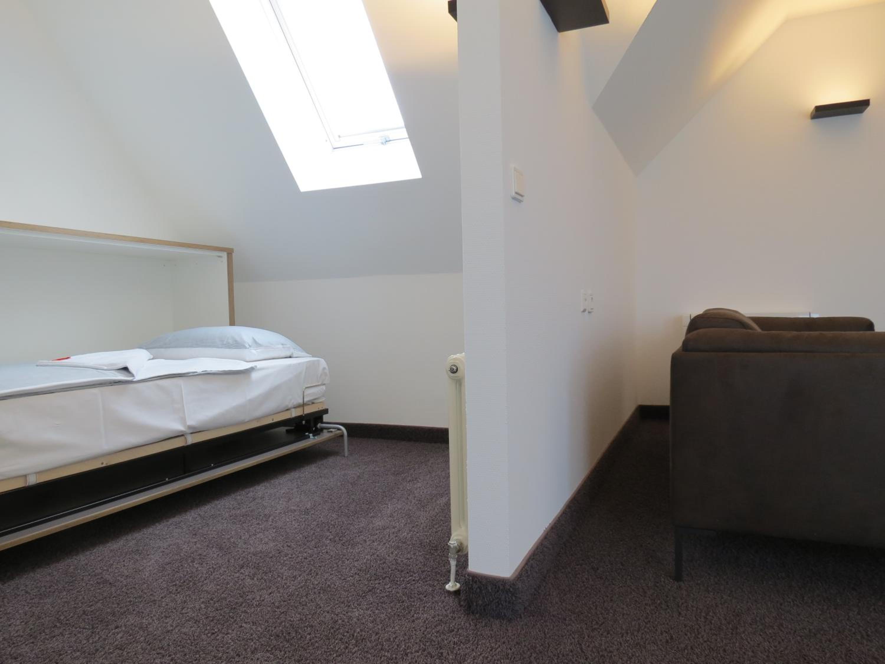 Economy Quadruple Room - Photo 15