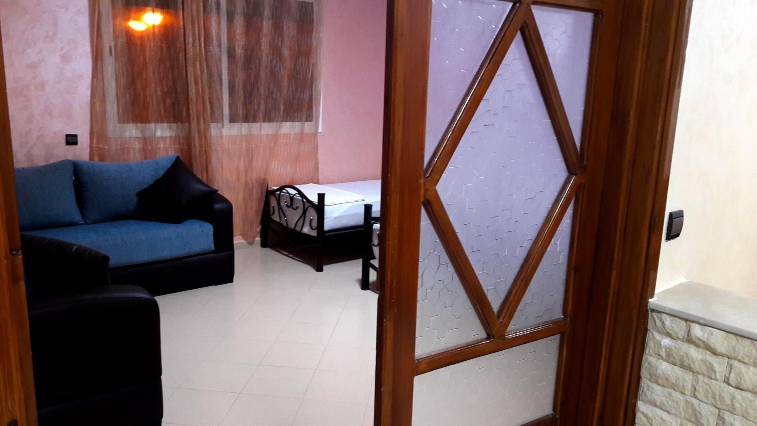 Three-Bedroom Apartment - Photo 11