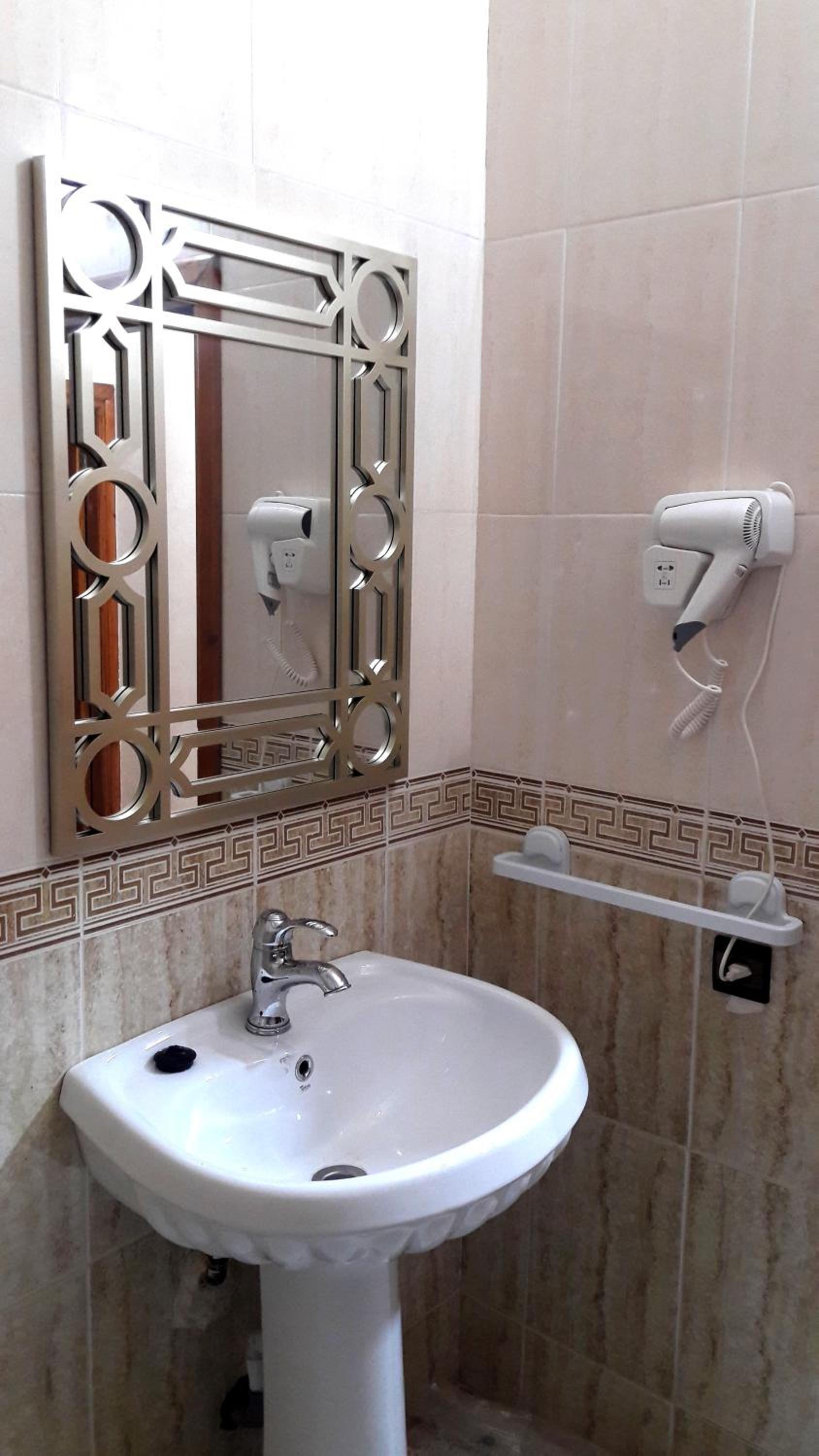 Three-Bedroom Apartment - Photo 10