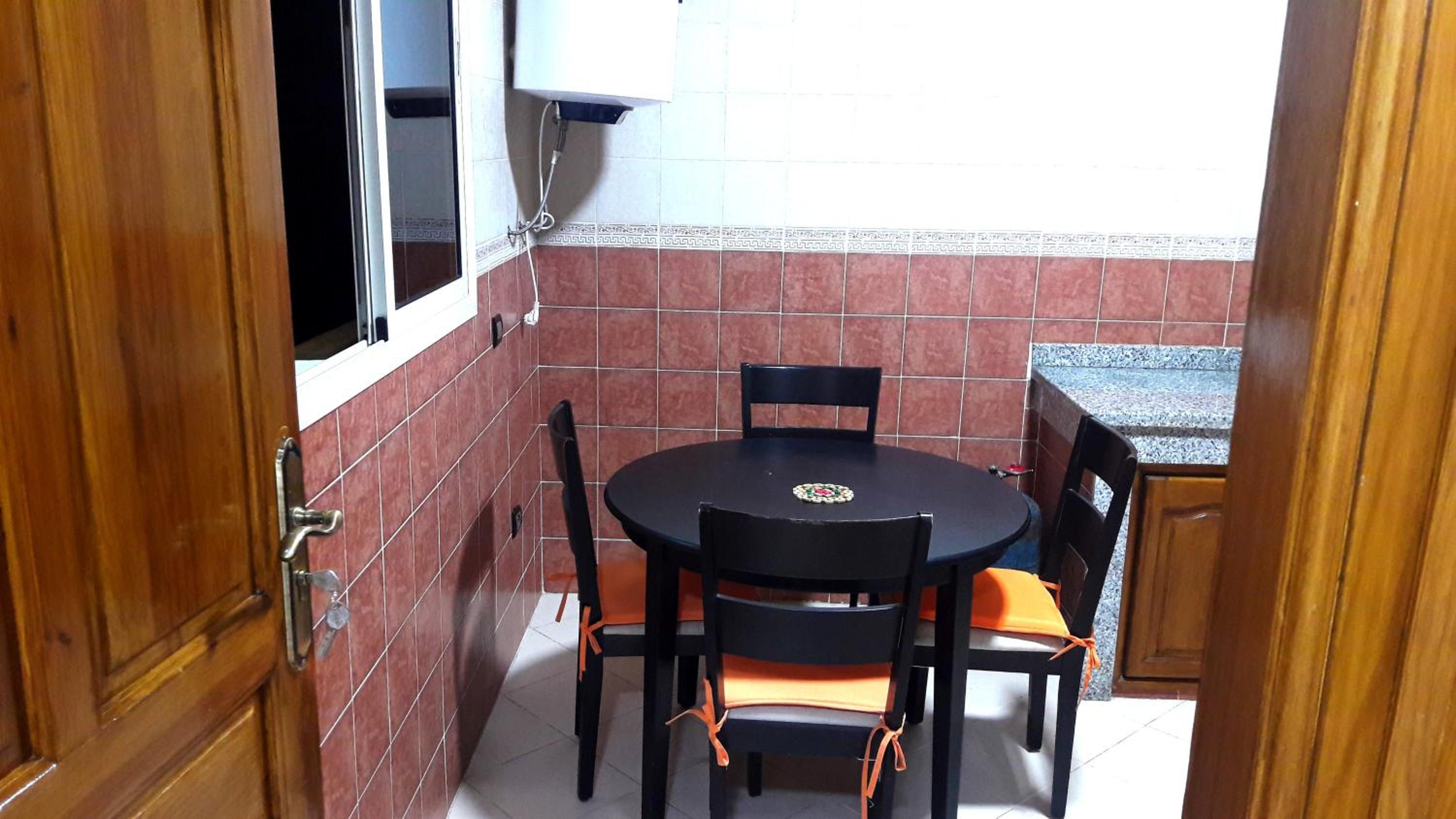 Three-Bedroom Apartment - Photo 2