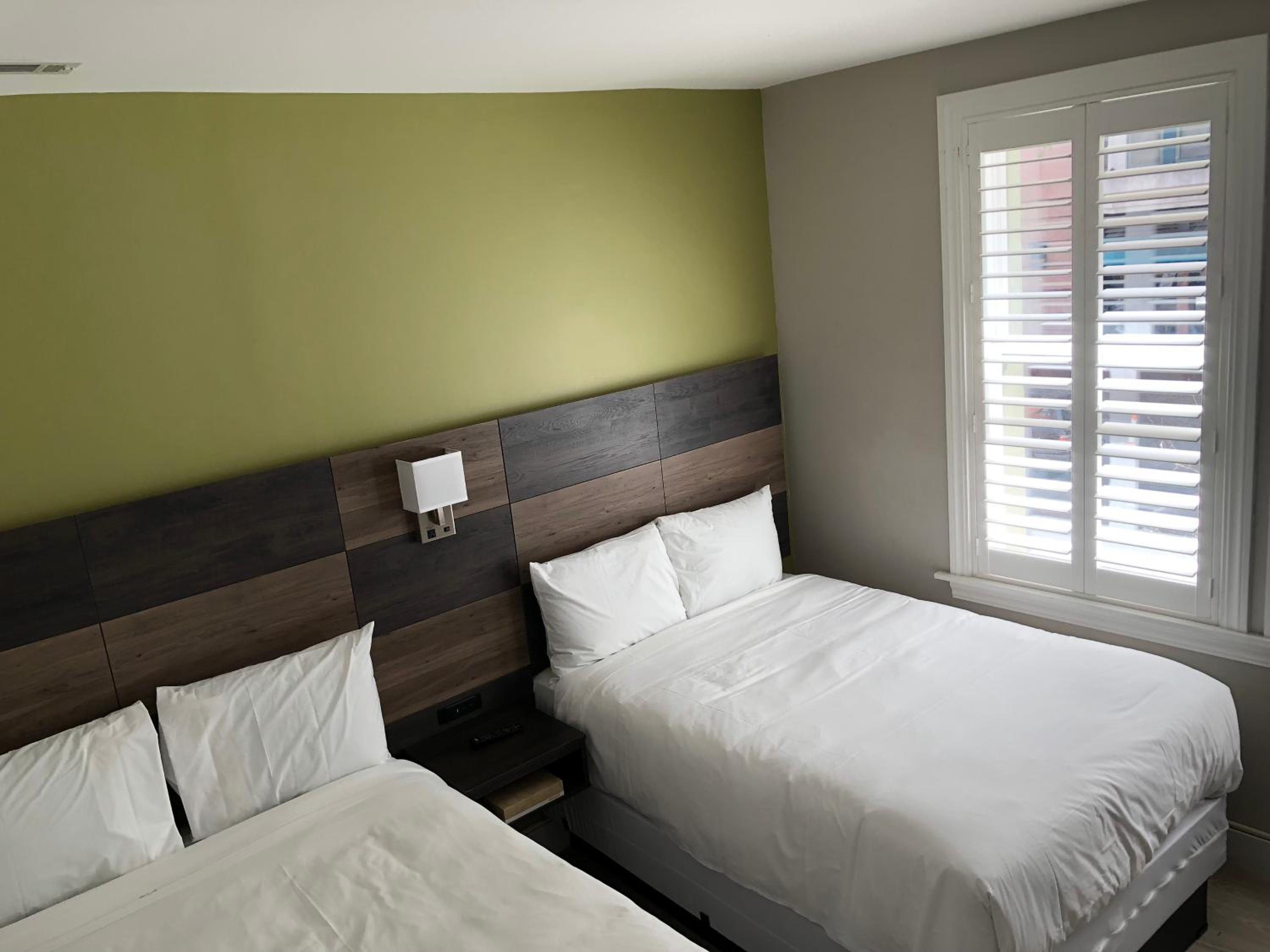 Two Double Beds With Private Bathroom