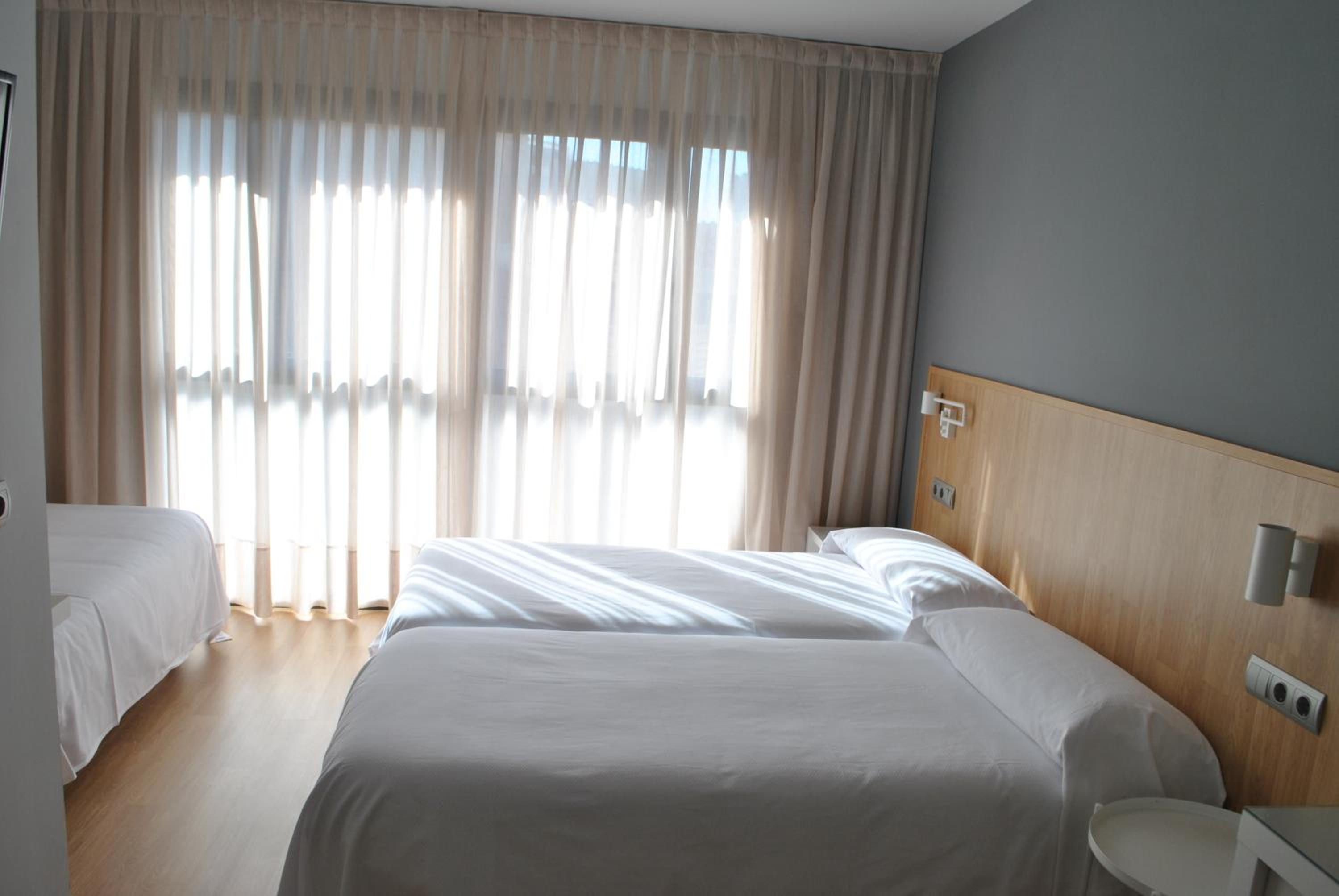 Habitación triple con baño