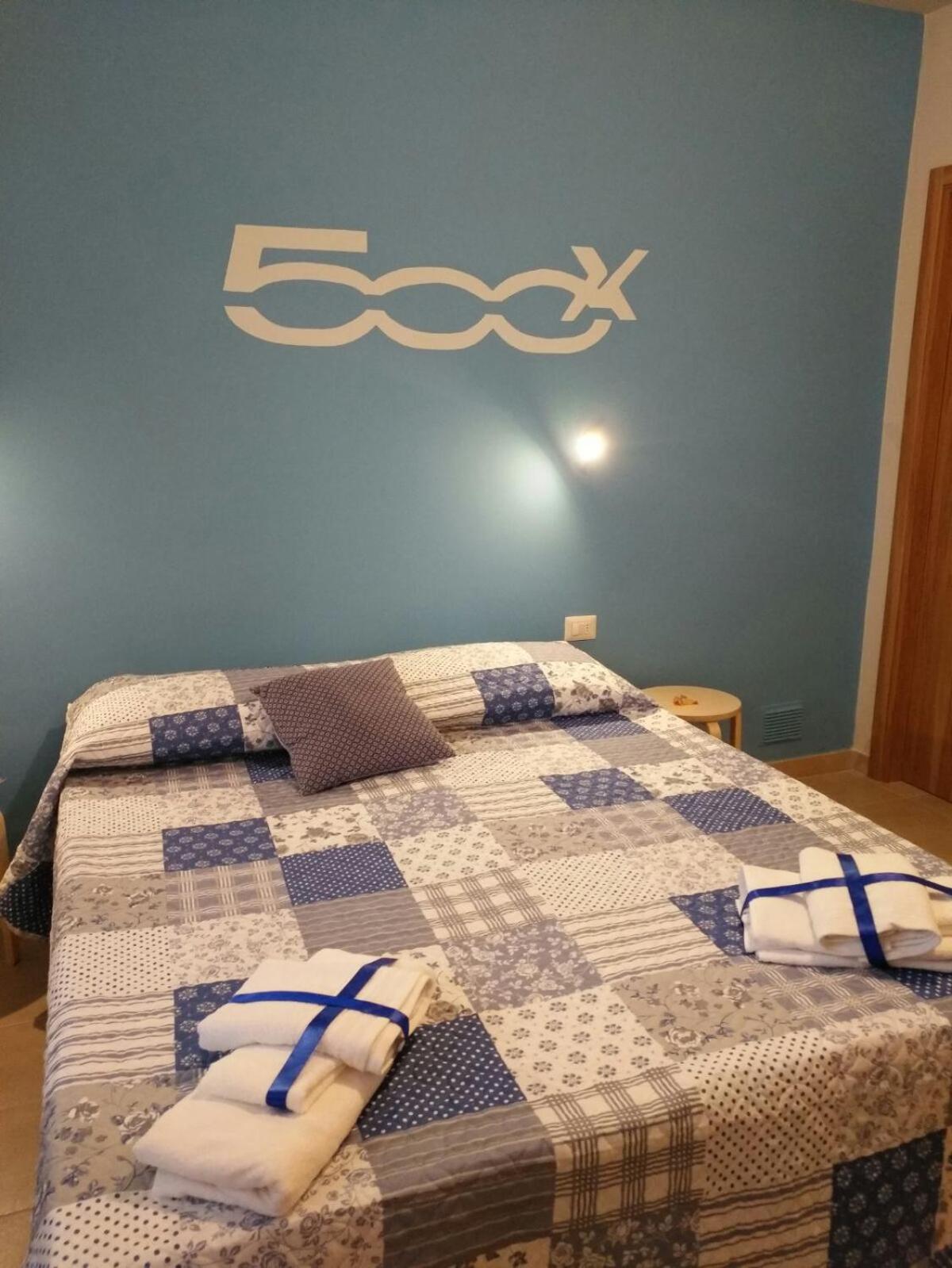 Quadruple Room with Private Bathroom photo 1