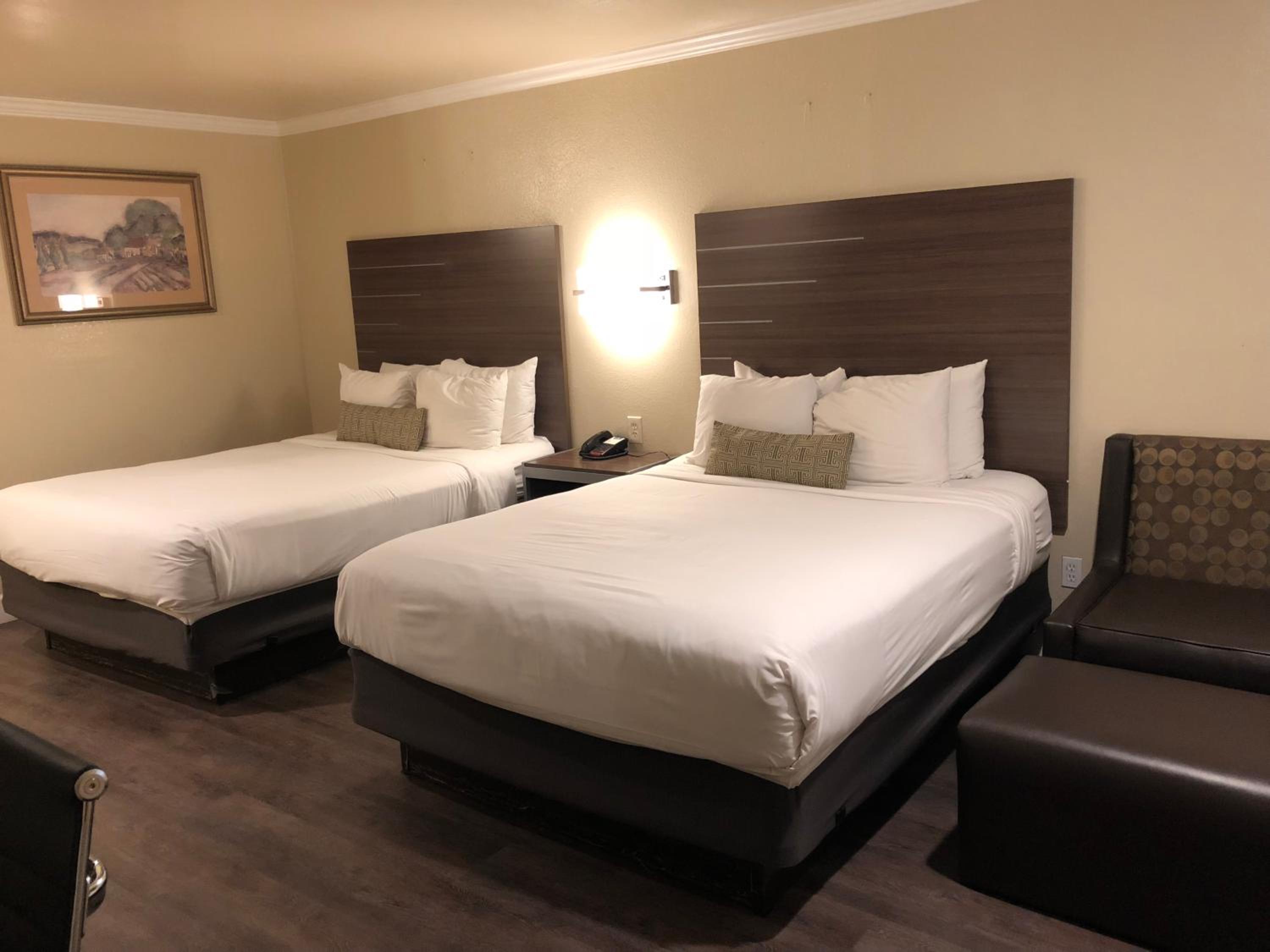 Queen Room with Two Queen Beds - Photo 1