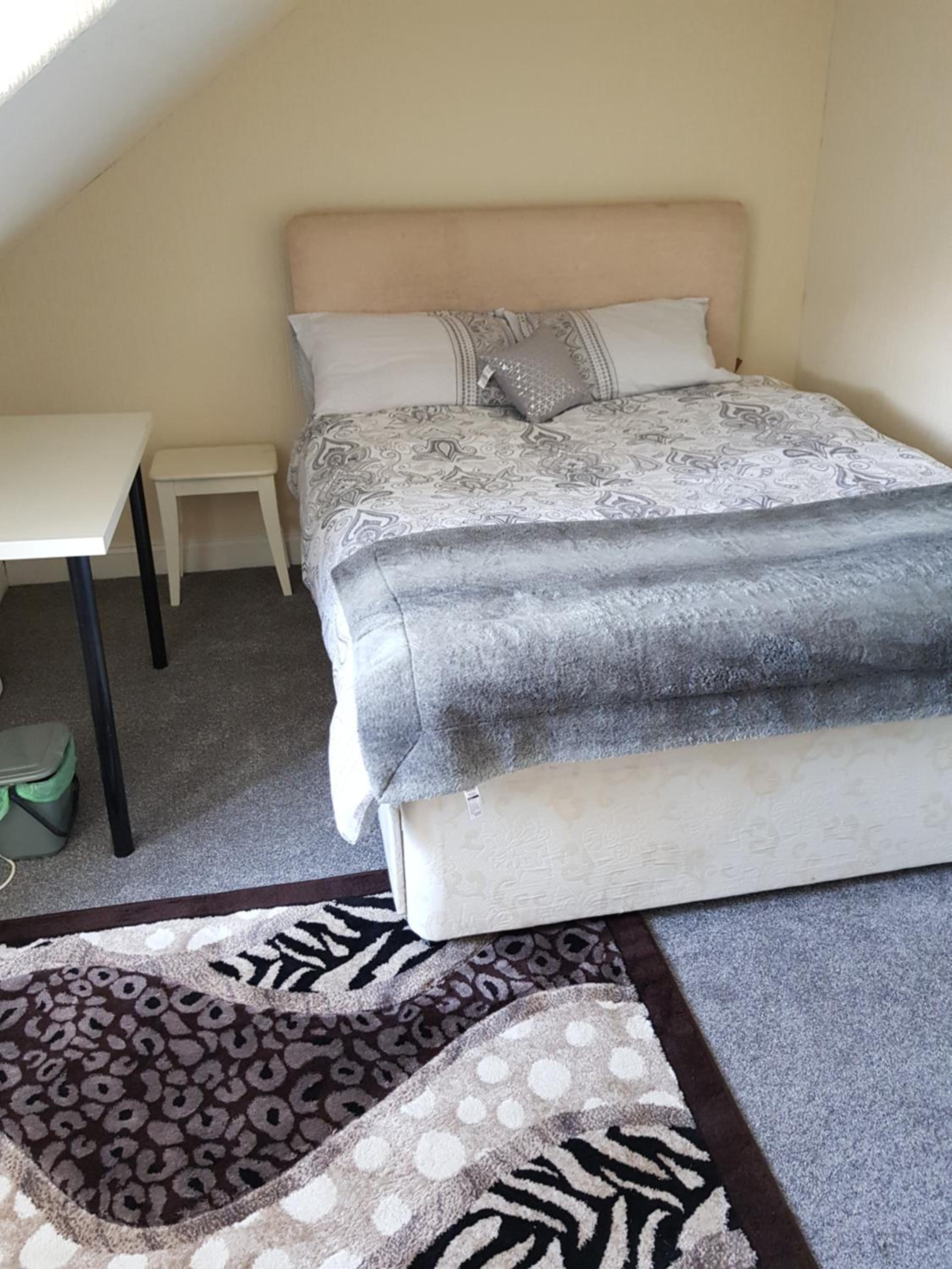 Economy Quadruple Room with Shared Bathroom
