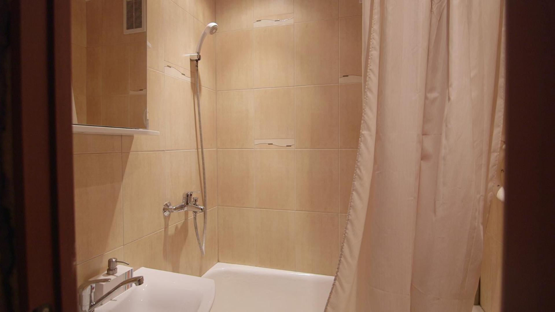 Three-Bedroom Apartment - Photo 9
