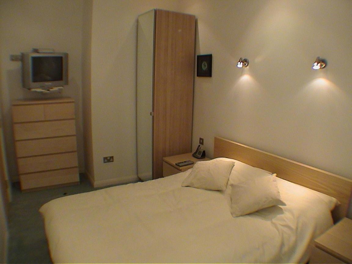 Three-Bedroom Apartment photo 1