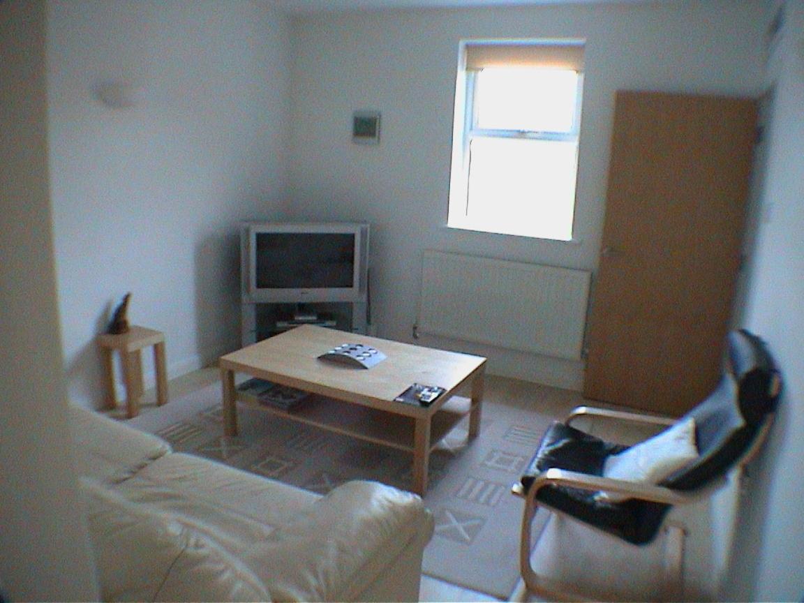 Three-Bedroom Apartment photo 2