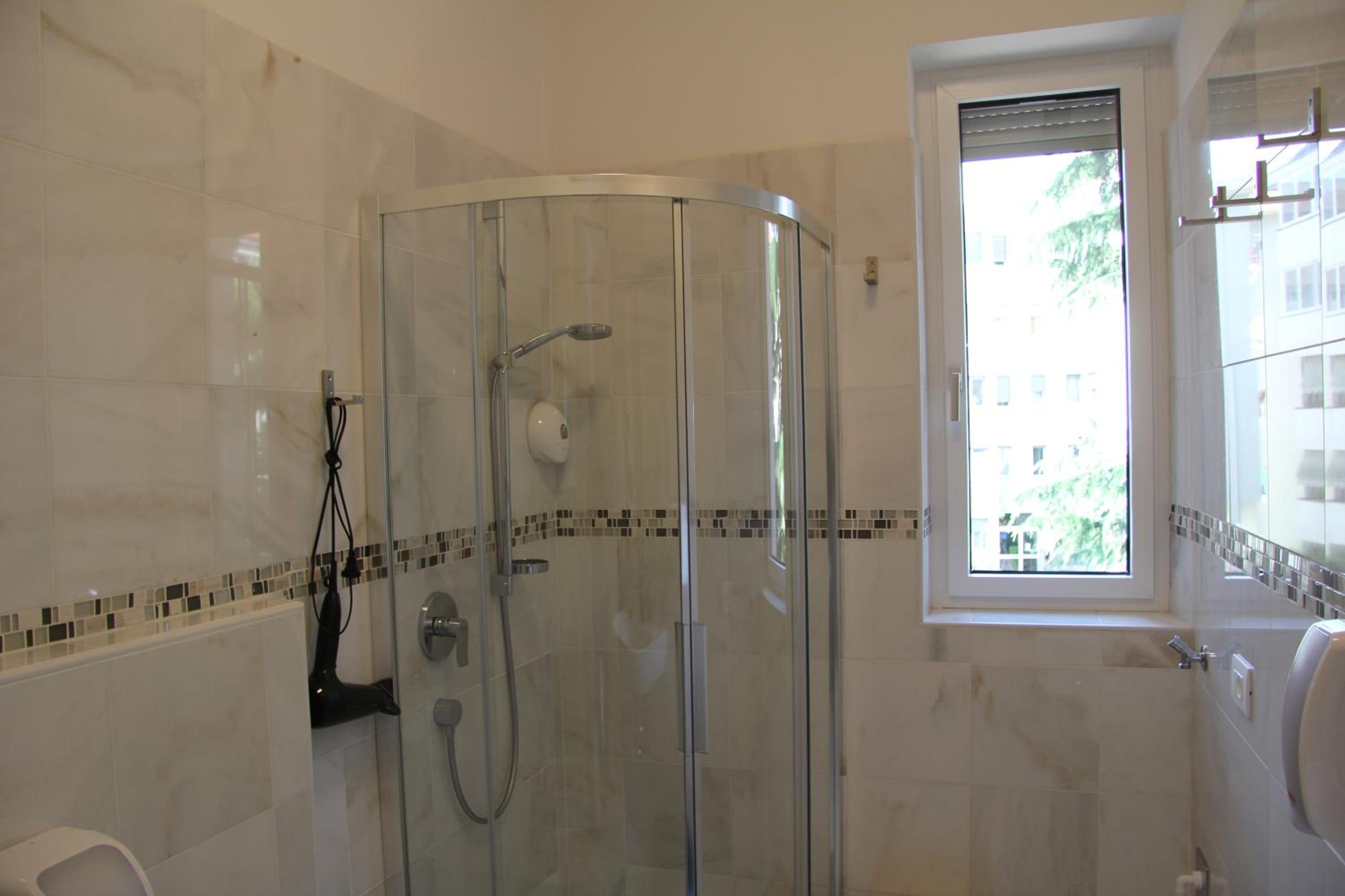 Two-Bedroom Apartment - Photo 19