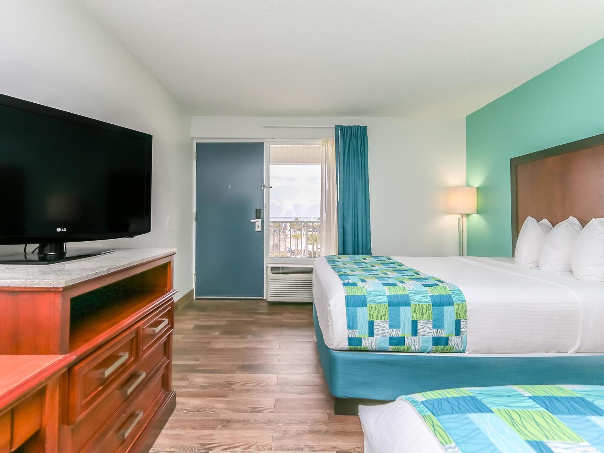 Standard Queen Room with Two Queen Beds - Photo 1
