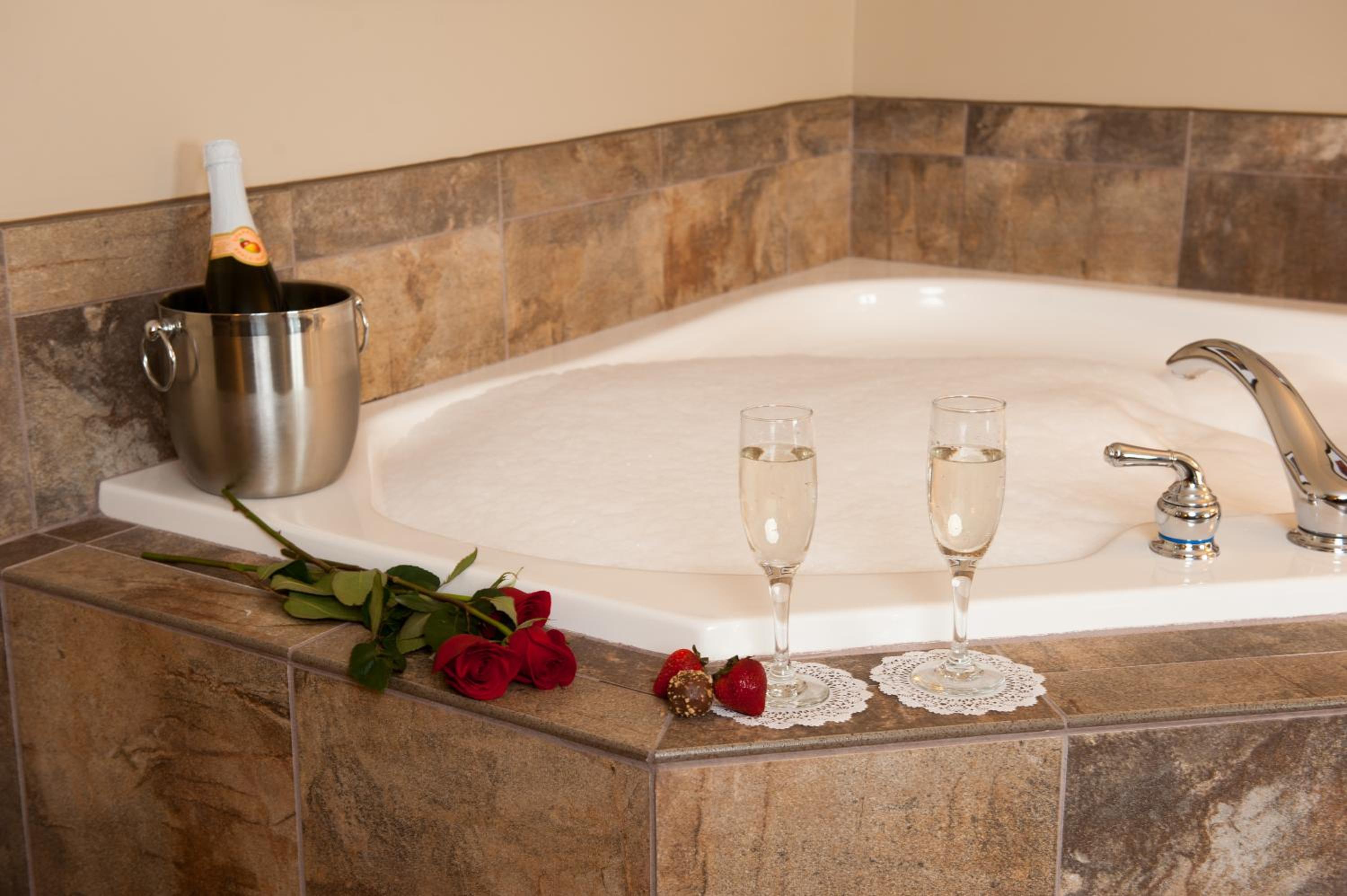 King Suite with Roll-In Shower, Sofa Bed and Spa Bath - Disability/Non-Smoking