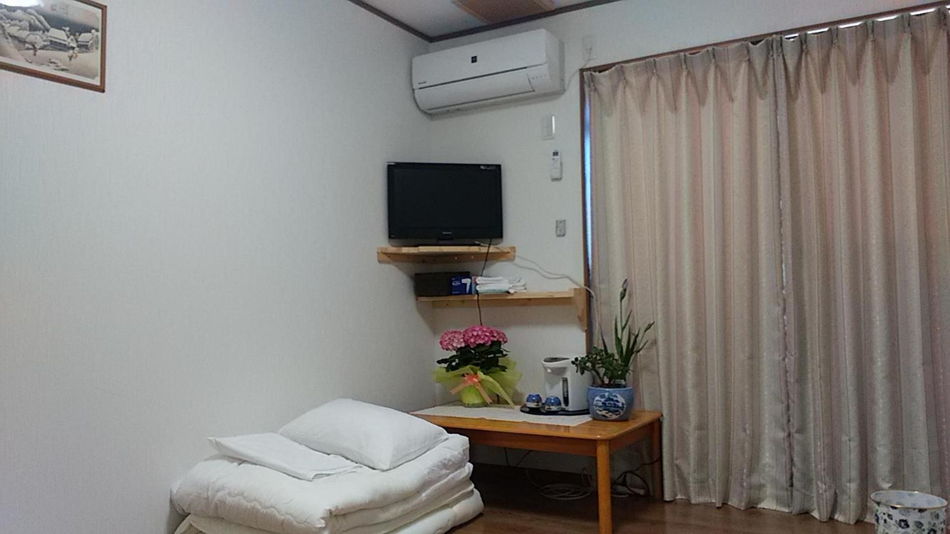 Economy Triple Room - Photo 9