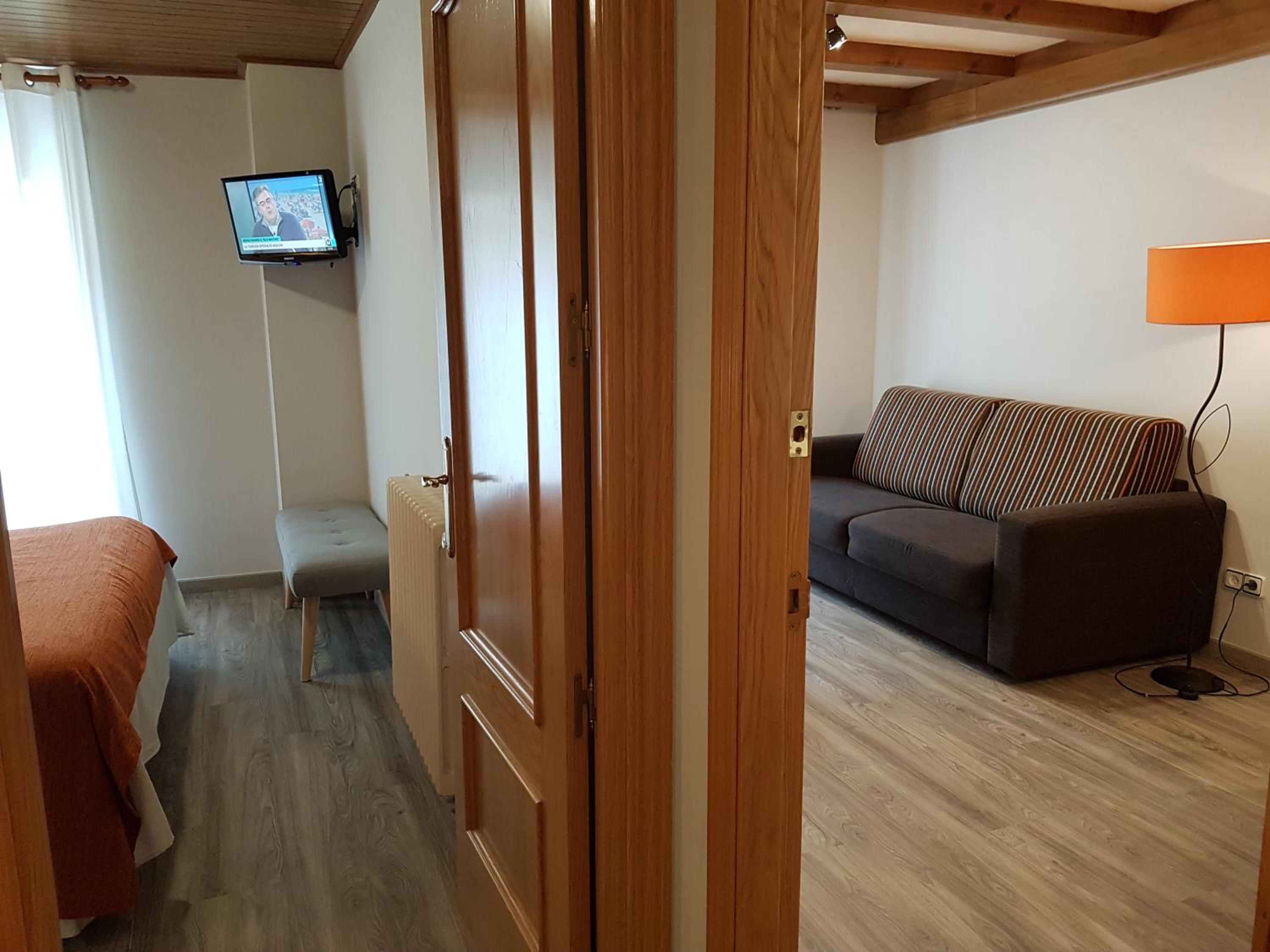 Habitación Cuádruple (2 Adultos + 2 Niños)