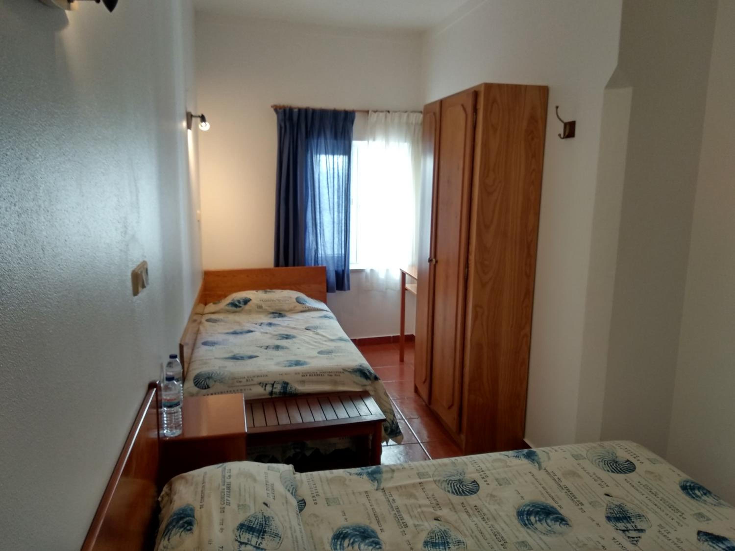 Triple Room with Private Bathroom - Photo 1