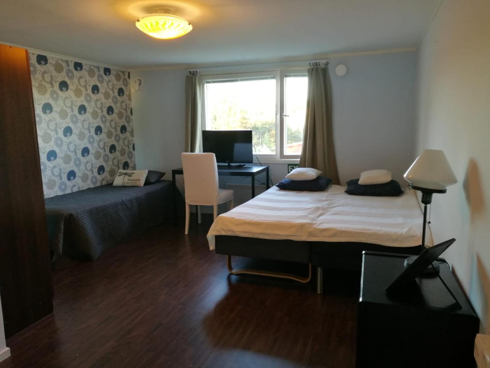 Basic Triple Room with Shared Bathroom photo 2