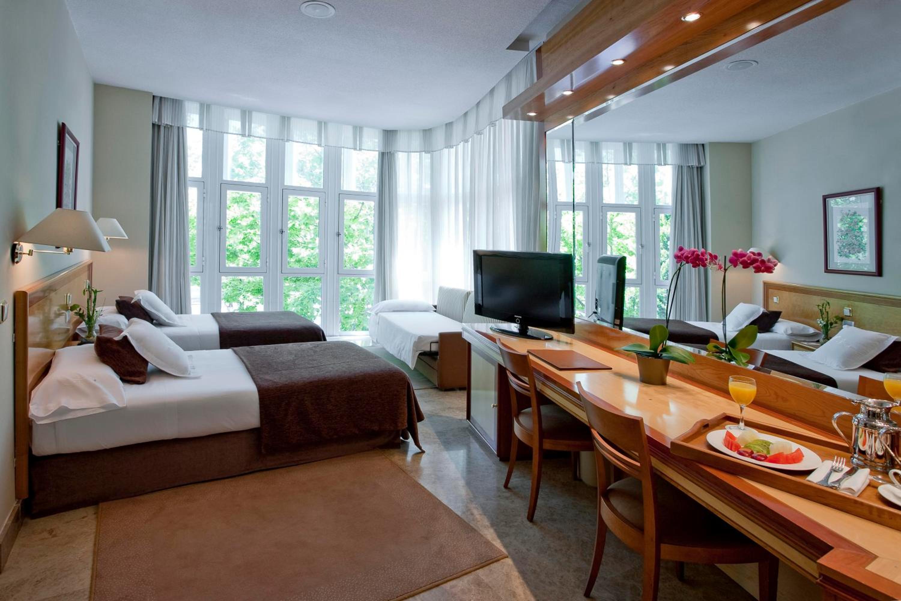 Habitación familiar (2 adultos + 1 niño)